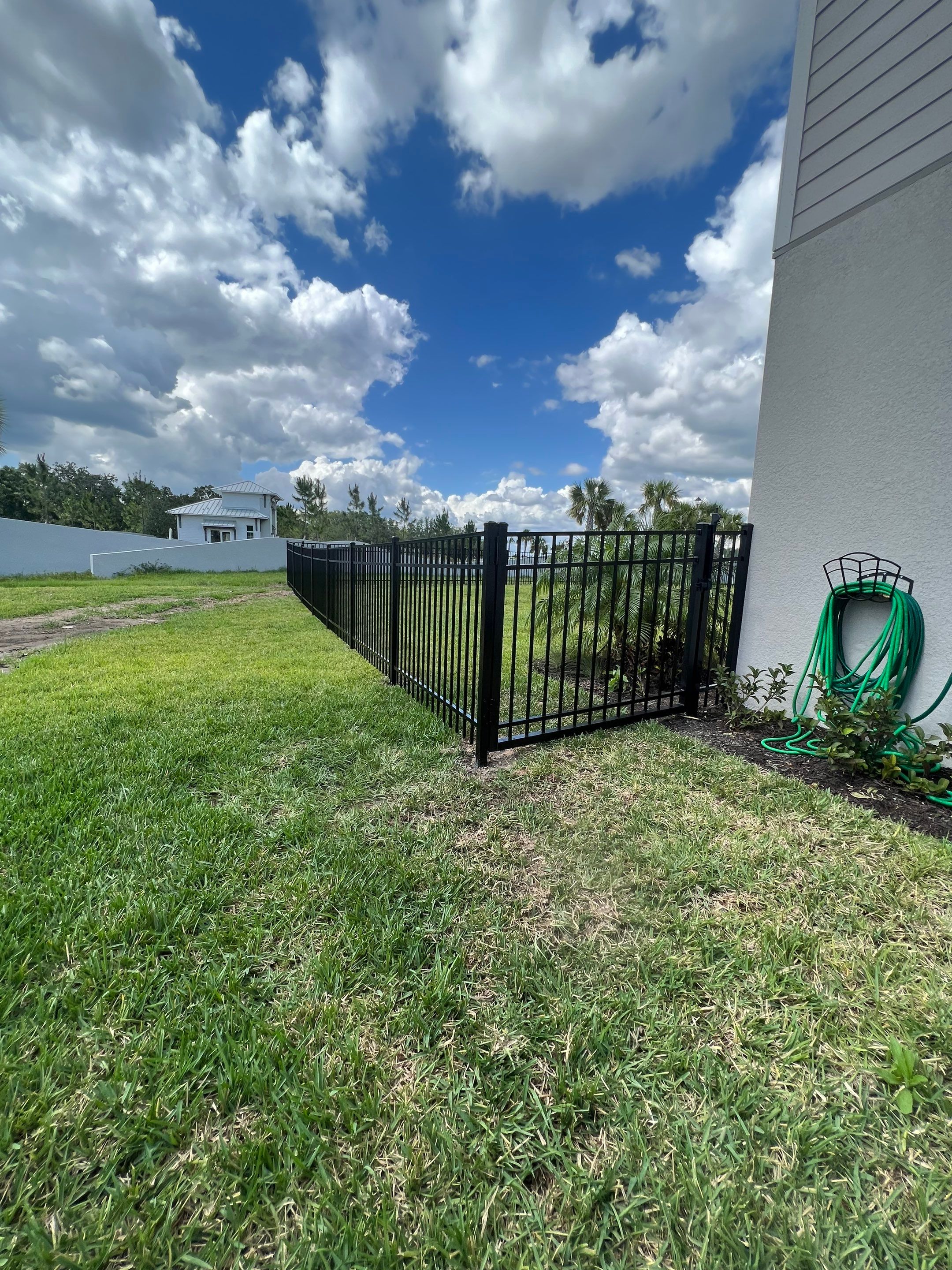 Aluminum Fence Installation using Black 3 Rail Aluminum Fence by Asap fence and gates, LLC