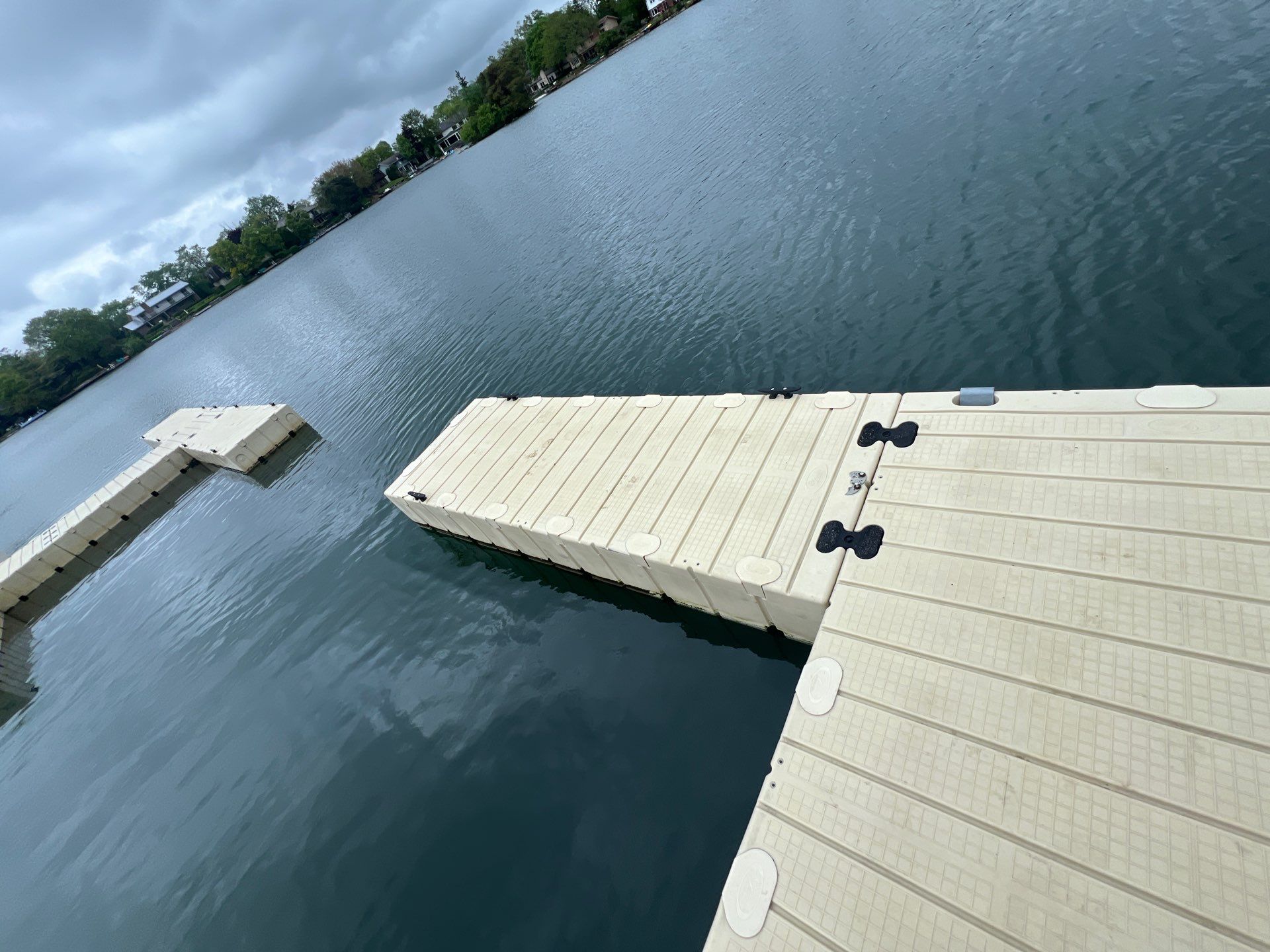 Power washing of floating dock by Northern Power Washing LLC.