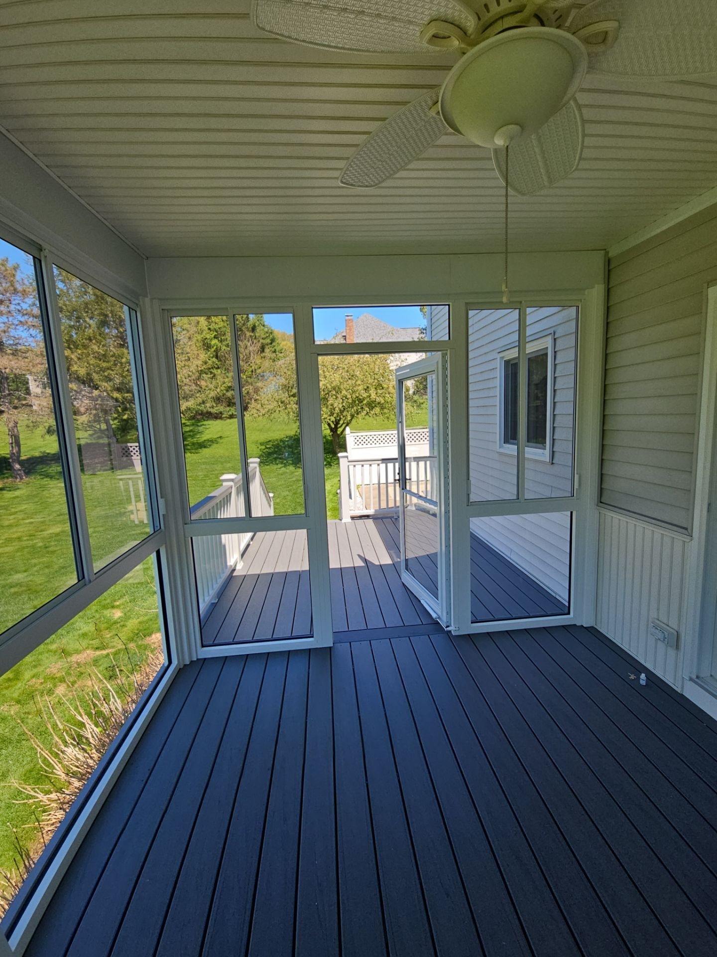 Summer Space Porch Enclosure Transformation by DiGiorgi Roofing and Siding Inc