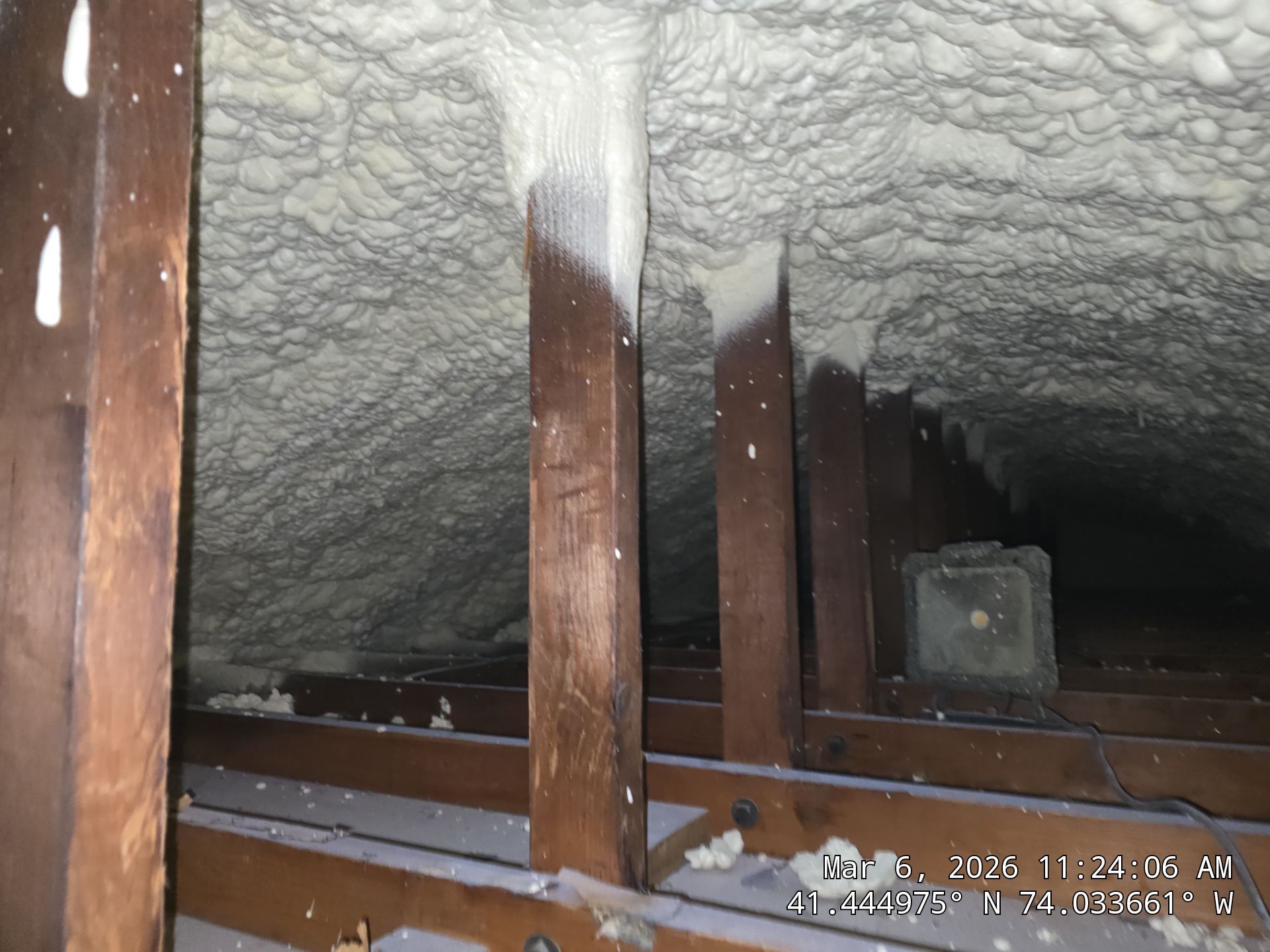 Attic Insulation using open cell spray foam by NYS Foam & Energy