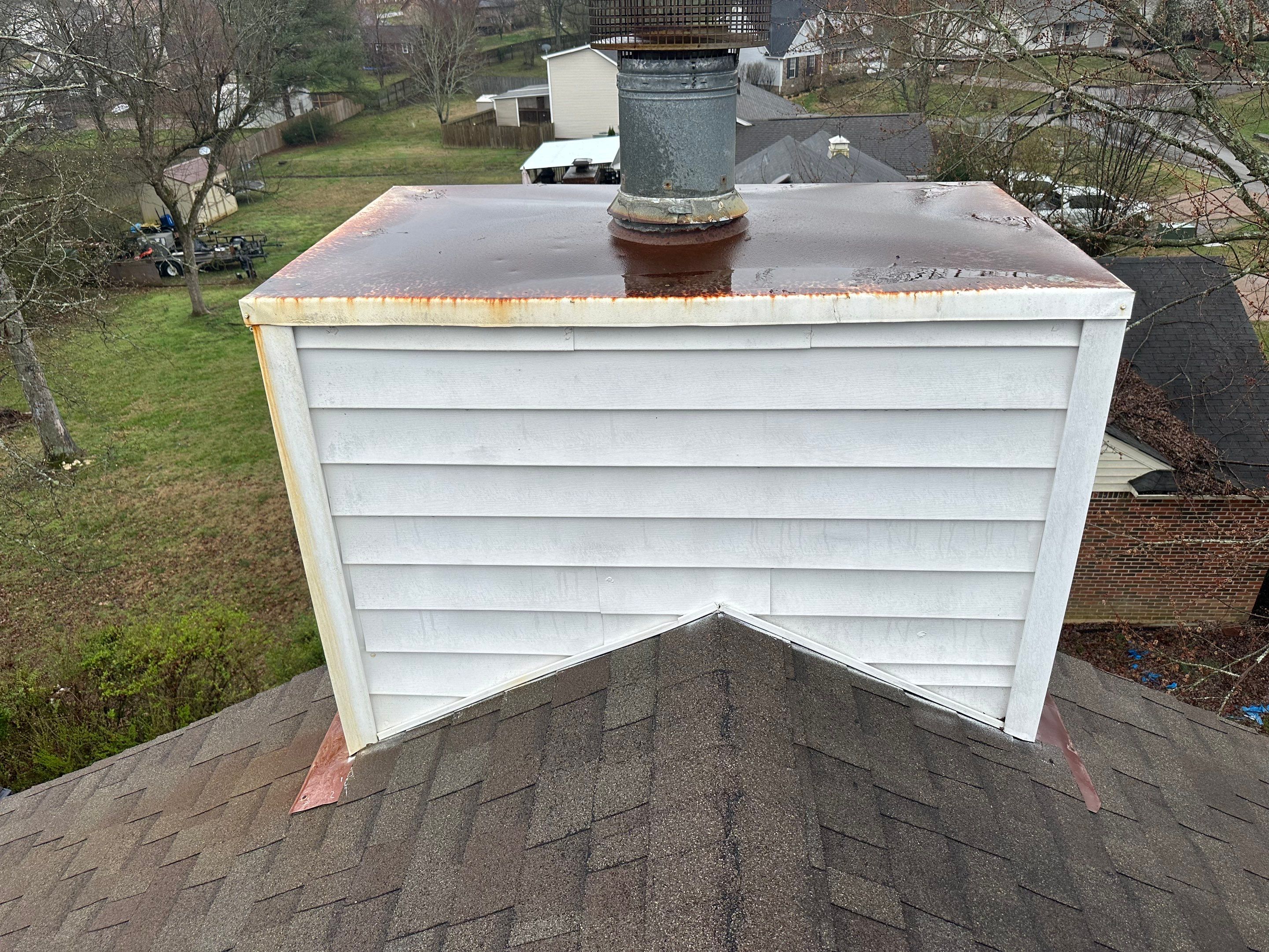 Residential Roofing Repair using Custom Fabricated Chimney Cap by Paragon Roofing