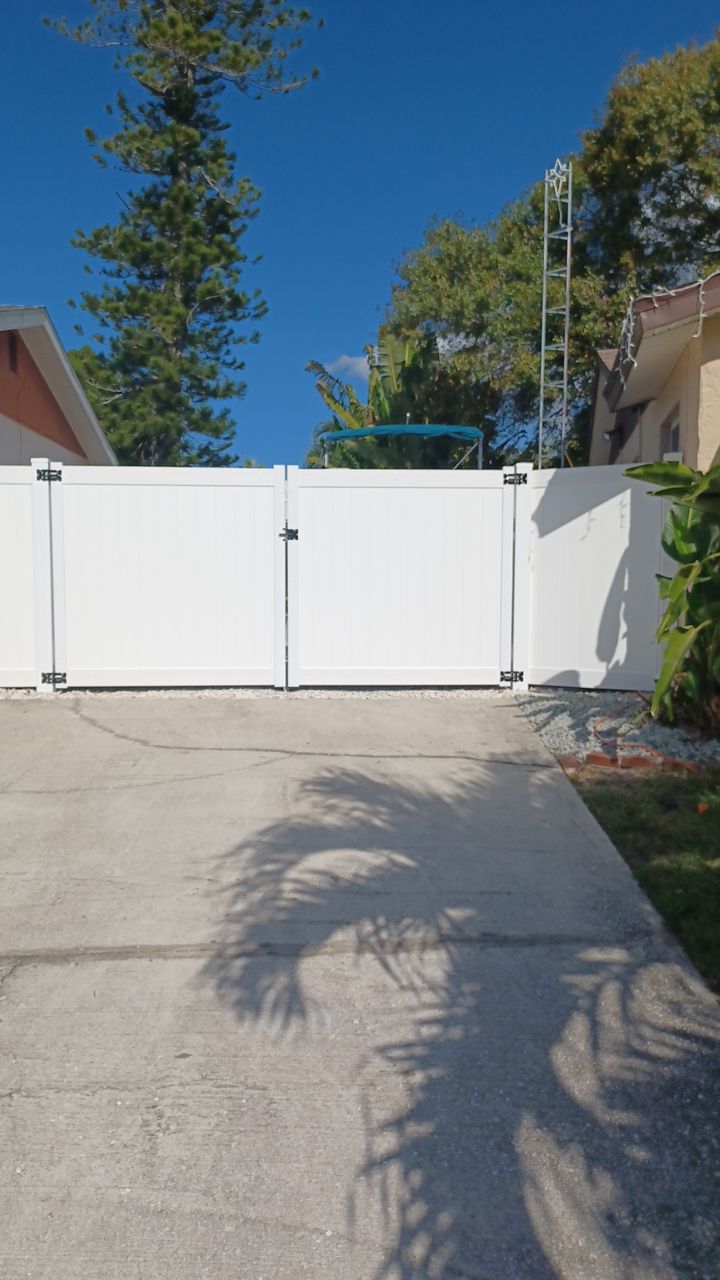 Bradenton, FL 6ft. Tall White Vinyl Privacy & Board on Board Wood Fence by Asap fence and gates, LLC