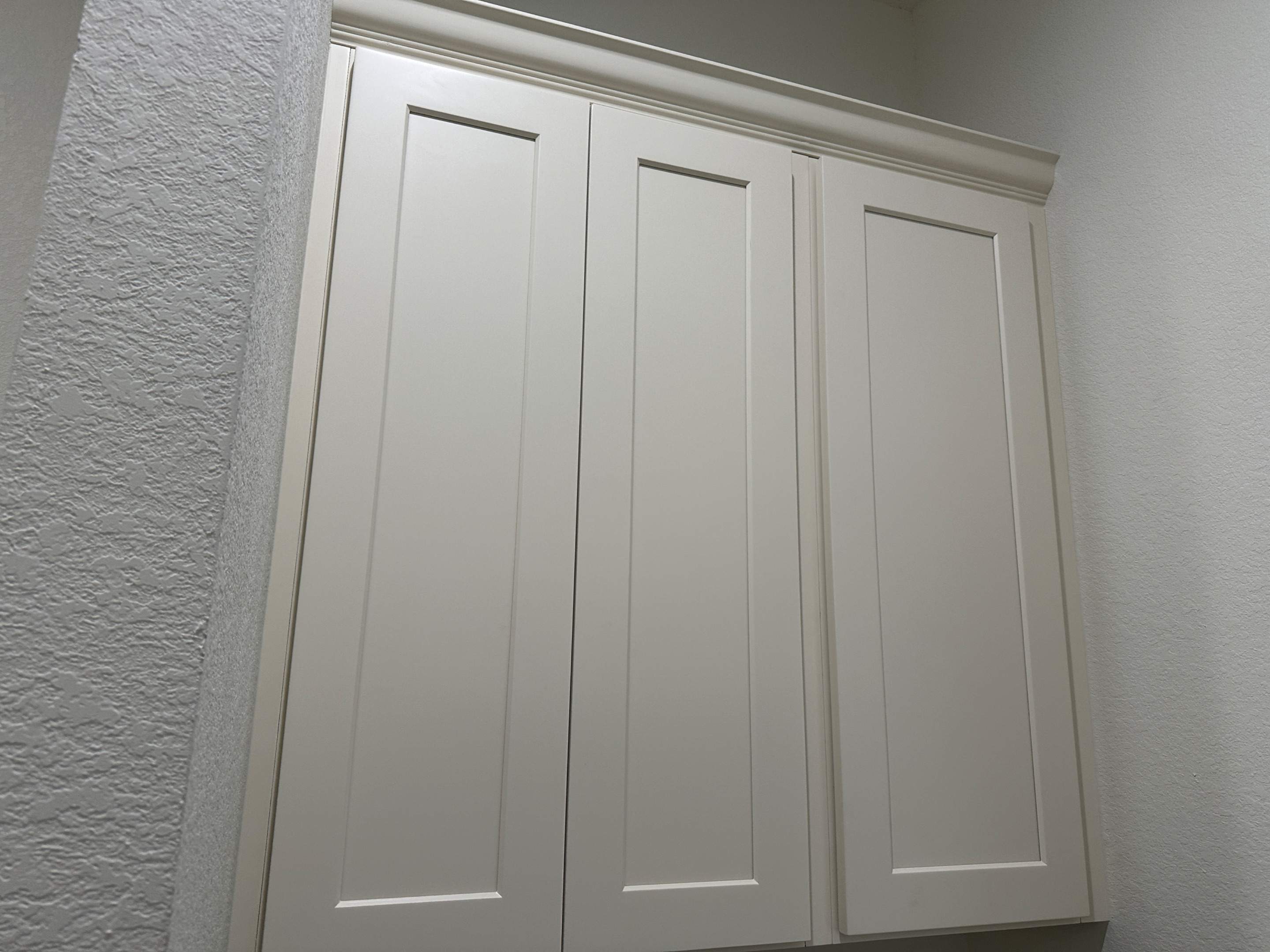 Antique shaker cabinets and granite kitchen and bathroom installation by Mena stone surfaces