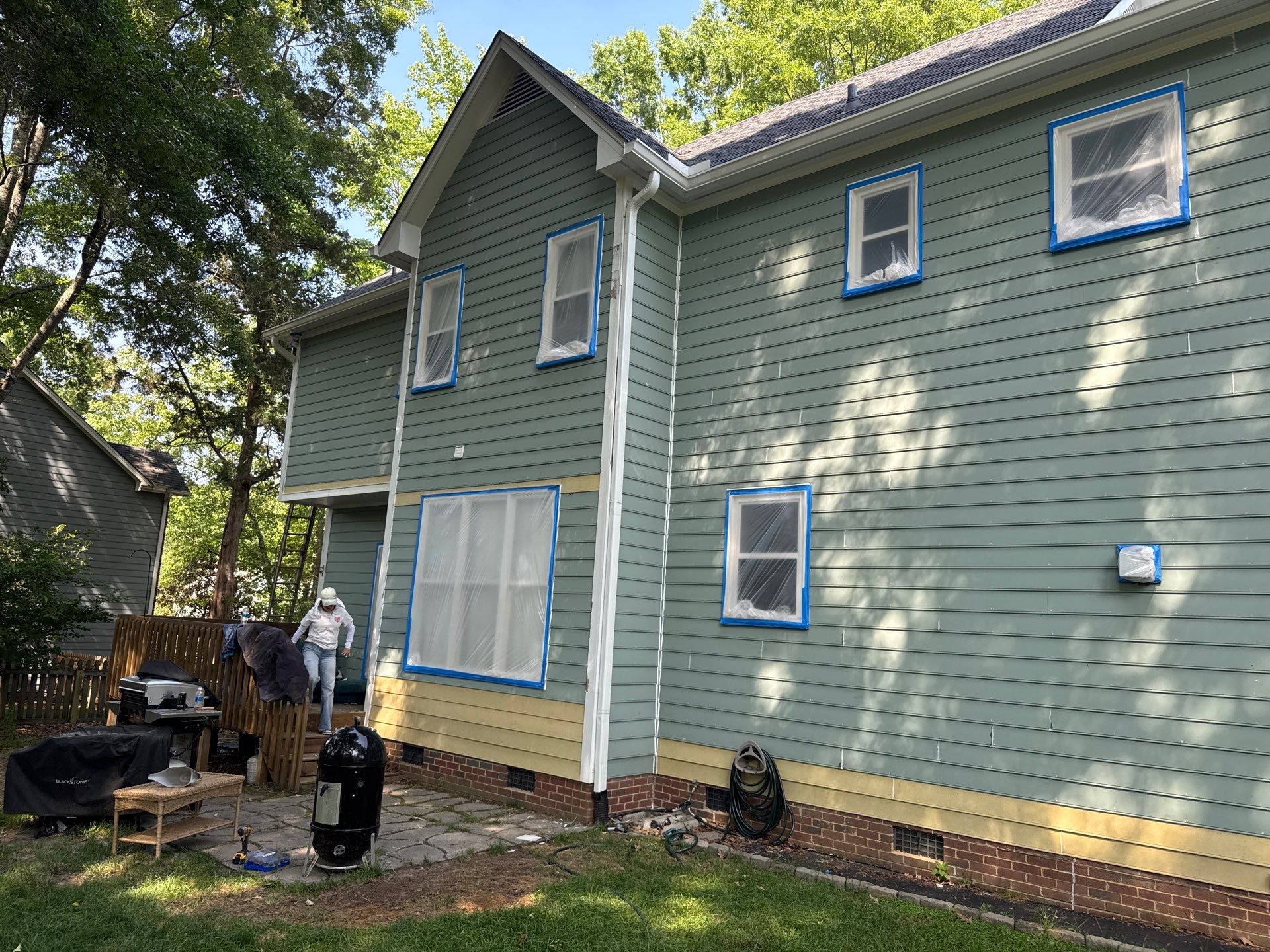 Siding Replacement and painting by GonzalezPainters & Contractors Inc 