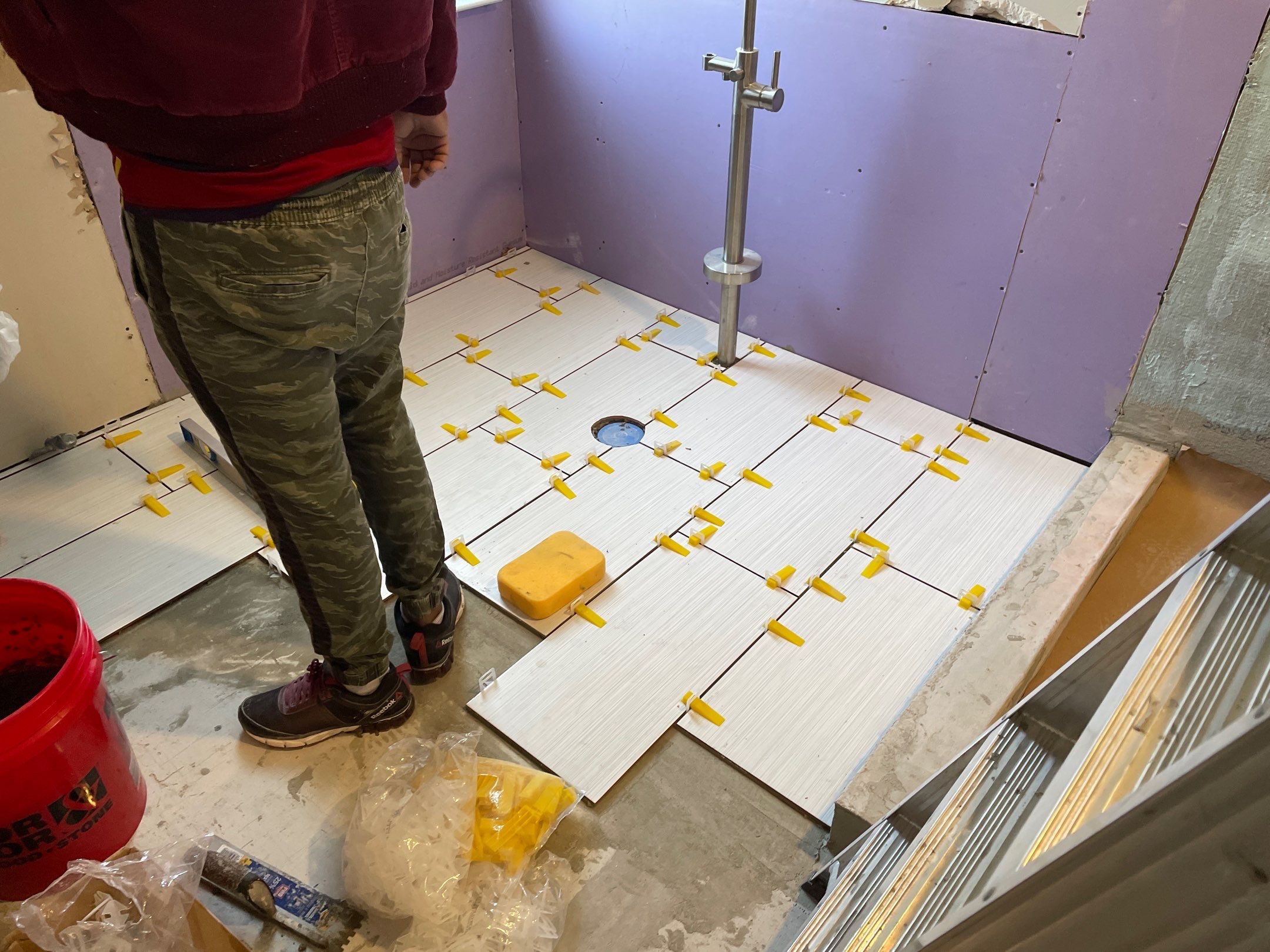 Bathroom Remodel using Schluter by Footprints Floors of Coastal Carolina