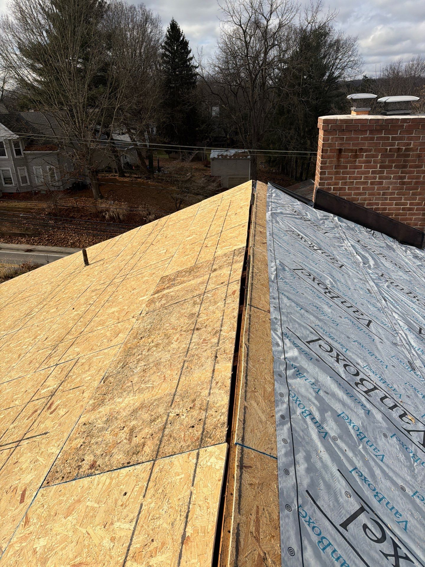 Residential Roofing Installation using GAF Timberline HDZ Mission Brown by Rainstoppers Roofing