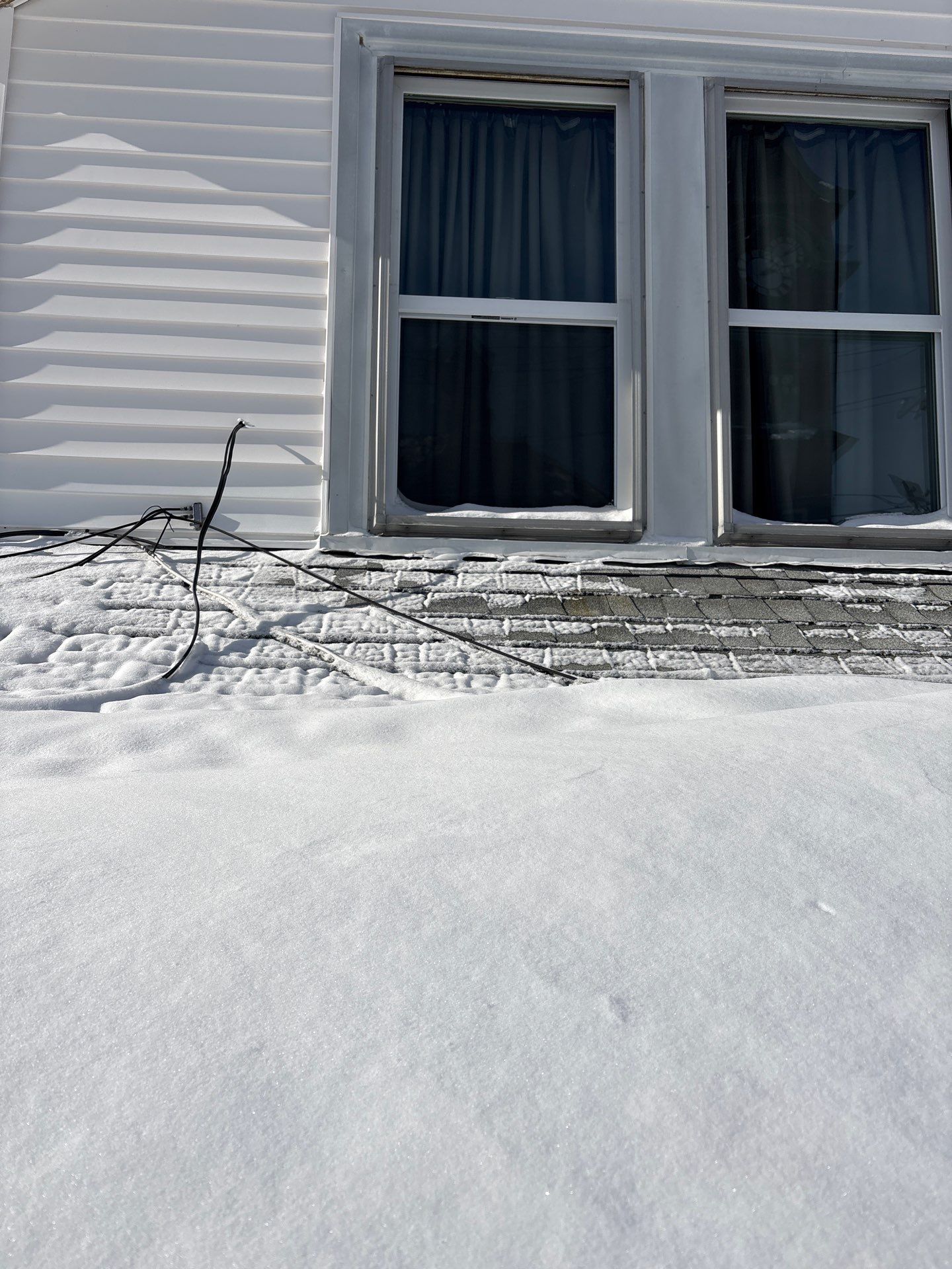 Emergency Snow Removal & Roof Tarp Installation in Lawrence, MA by Mighty Dog Roofing of Greater Middlesex County