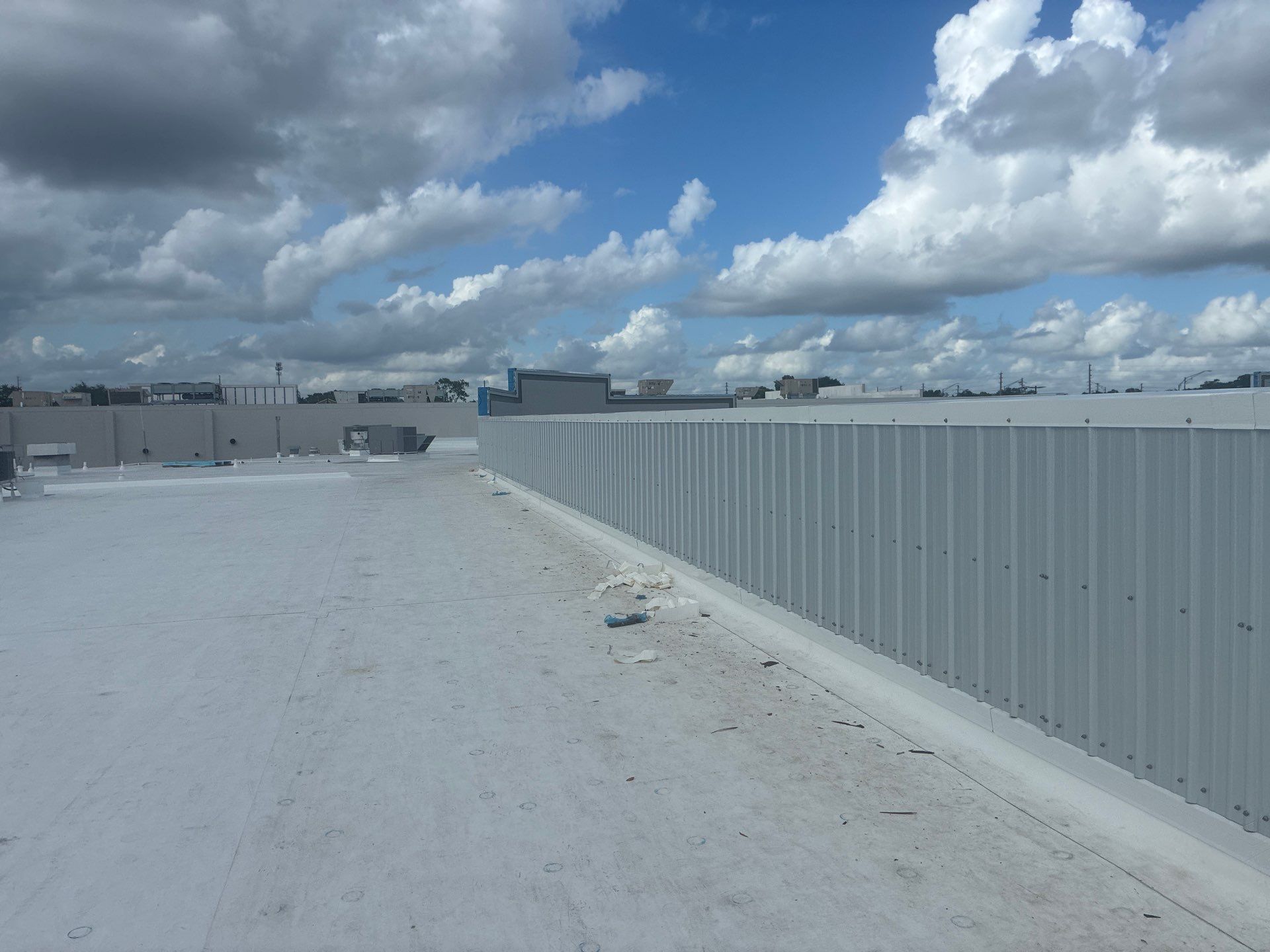 Orlando Commercial Roof Installation and Metal Parapet Wall Siding by Tip Top Roofing Co., Inc.