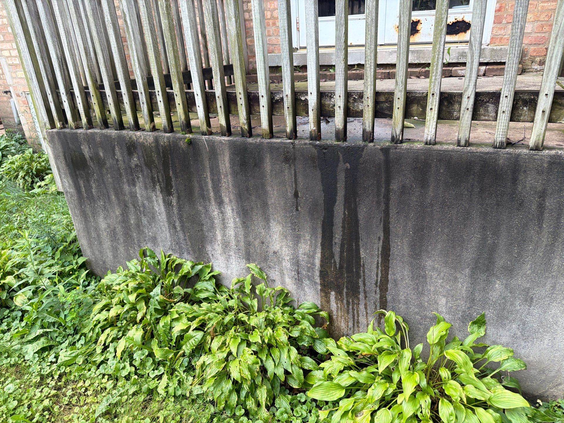 Wood fence cleaning and sealing by Northern Power Washing LLC.