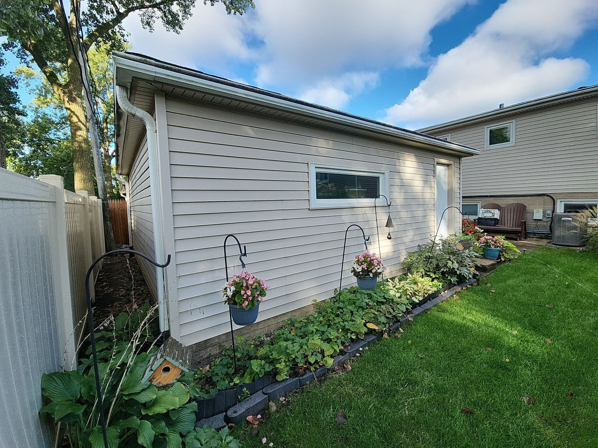Exterior House, Detached Garage & Window Cleaning by Northern Power Washing LLC.