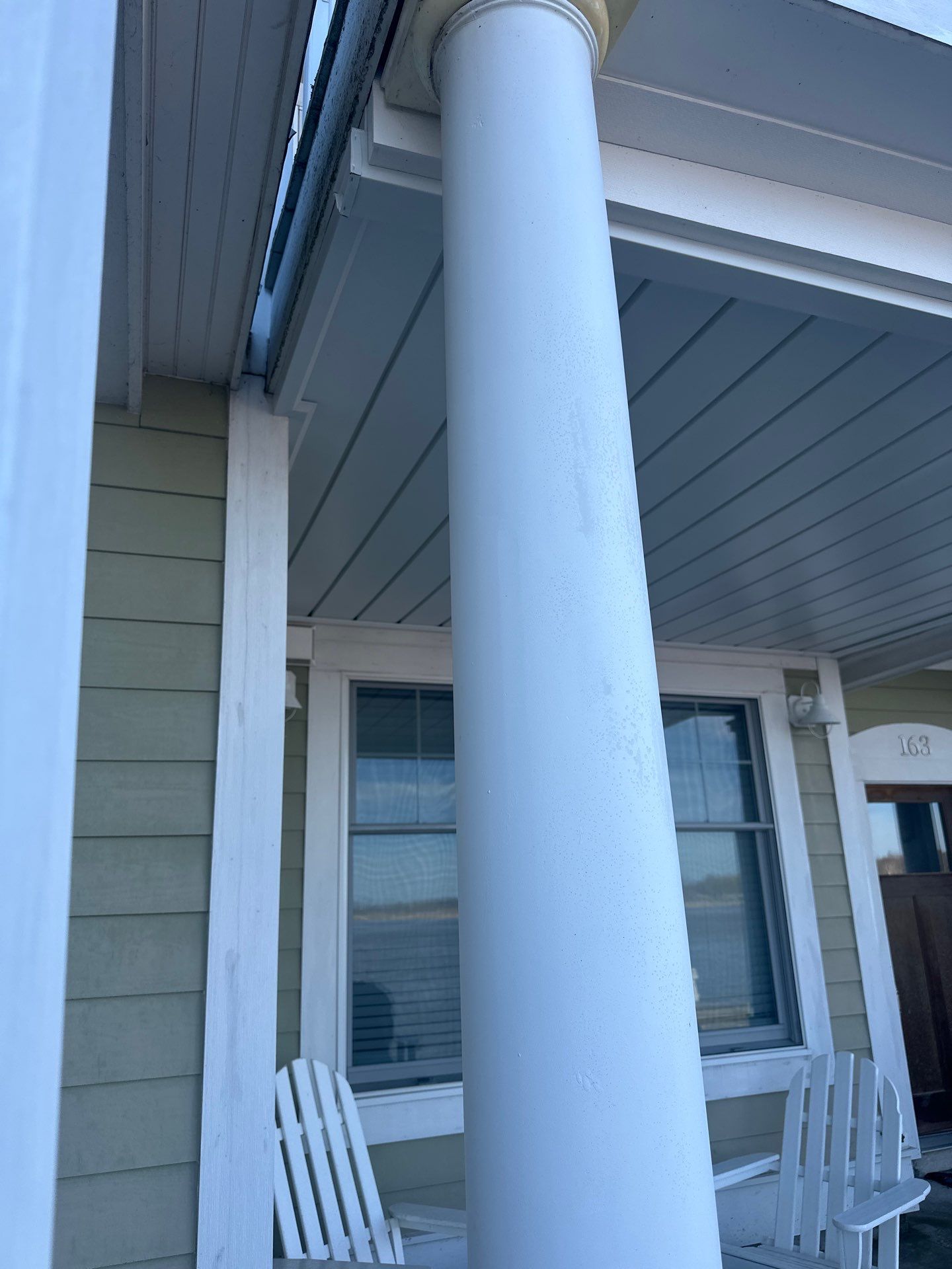 Waterfront Underdeck System Installation and Covered Patio in Manistee by Rainbow Seamless Systems