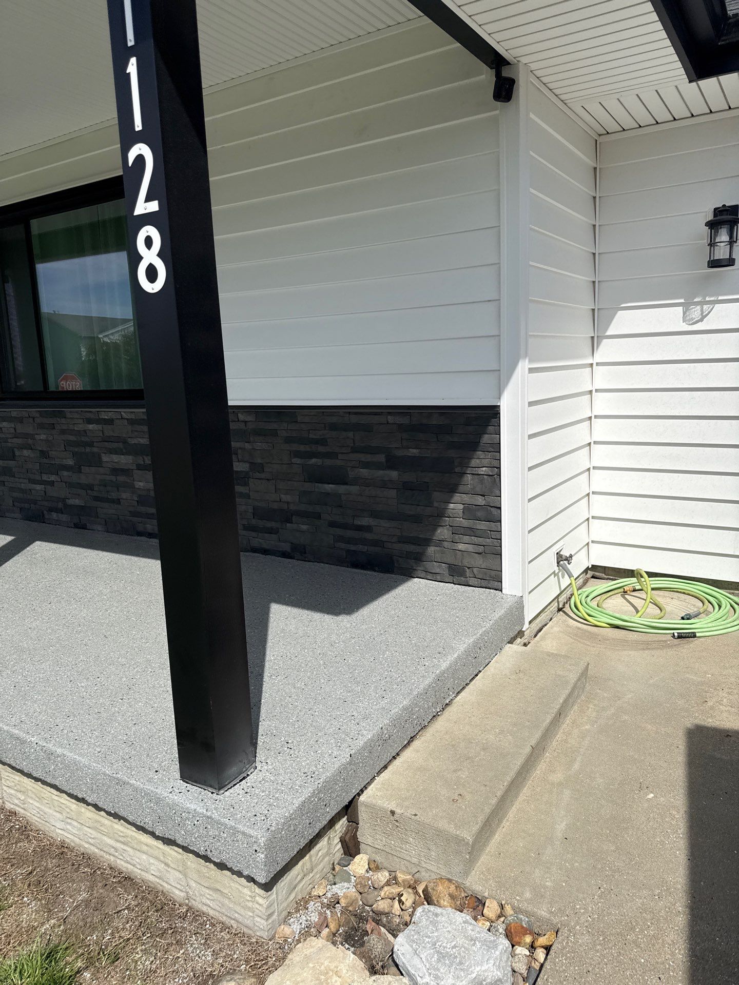 Indianola Porch Transformation by Revival Concrete Coatings