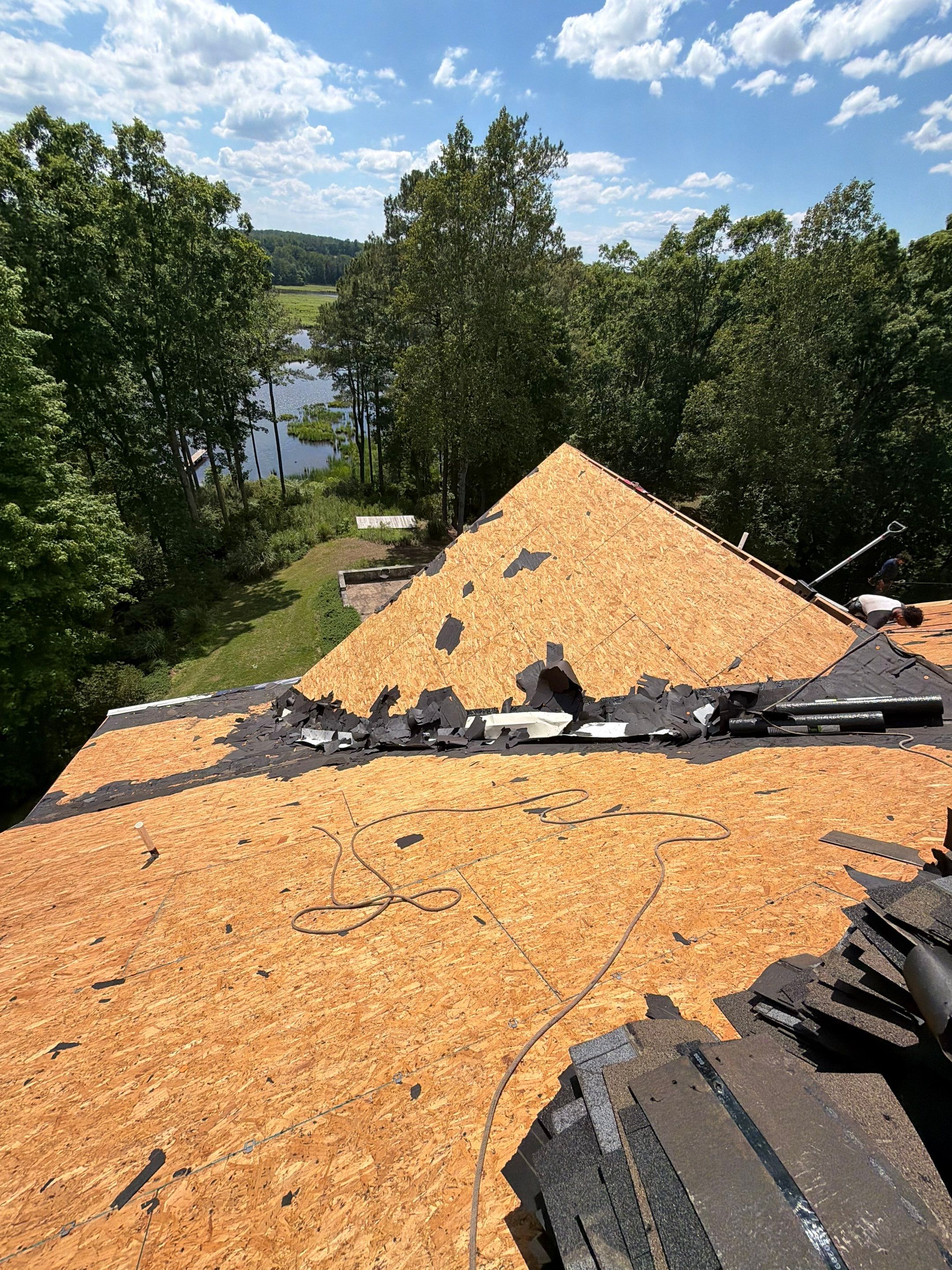 Lancaster Roof Replacement Featuring Architectural Shingles and Attic Insulation by Cade Construction
