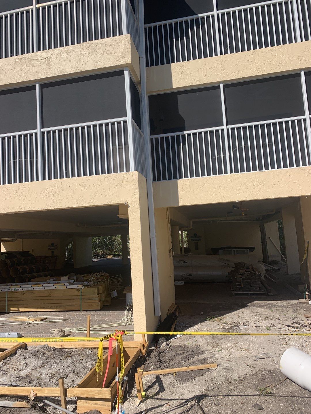 White Seamless Gutters and Downspouts in Sanibel FL by Gutter Professors