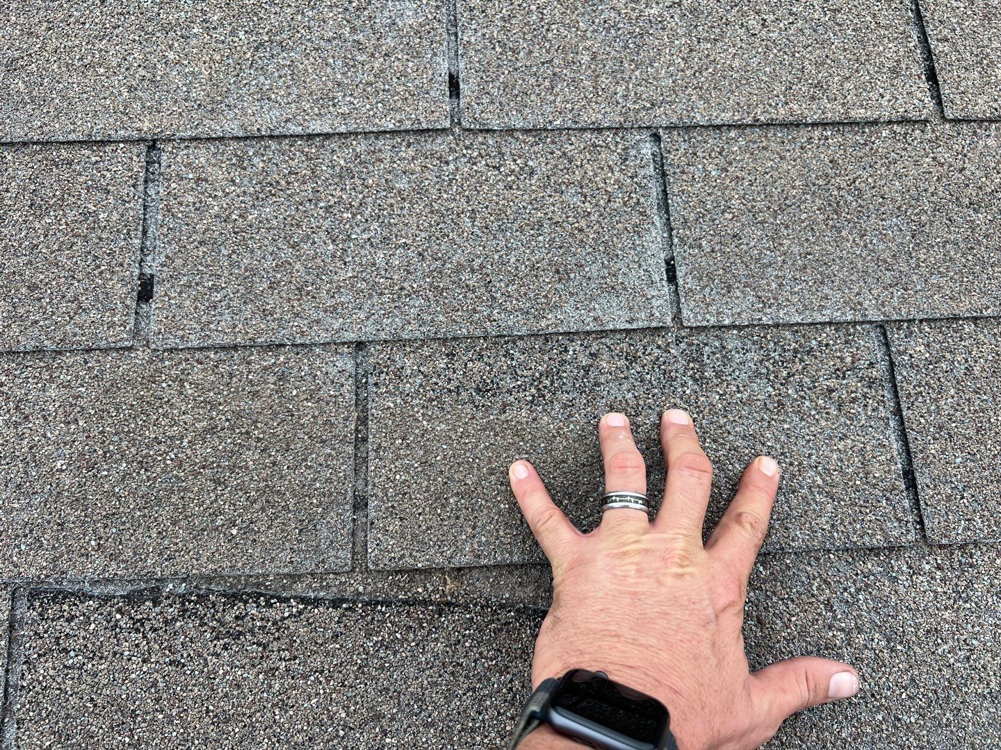 Wind damaged roof replacement by Oakwood Roofing and Construction, LLC