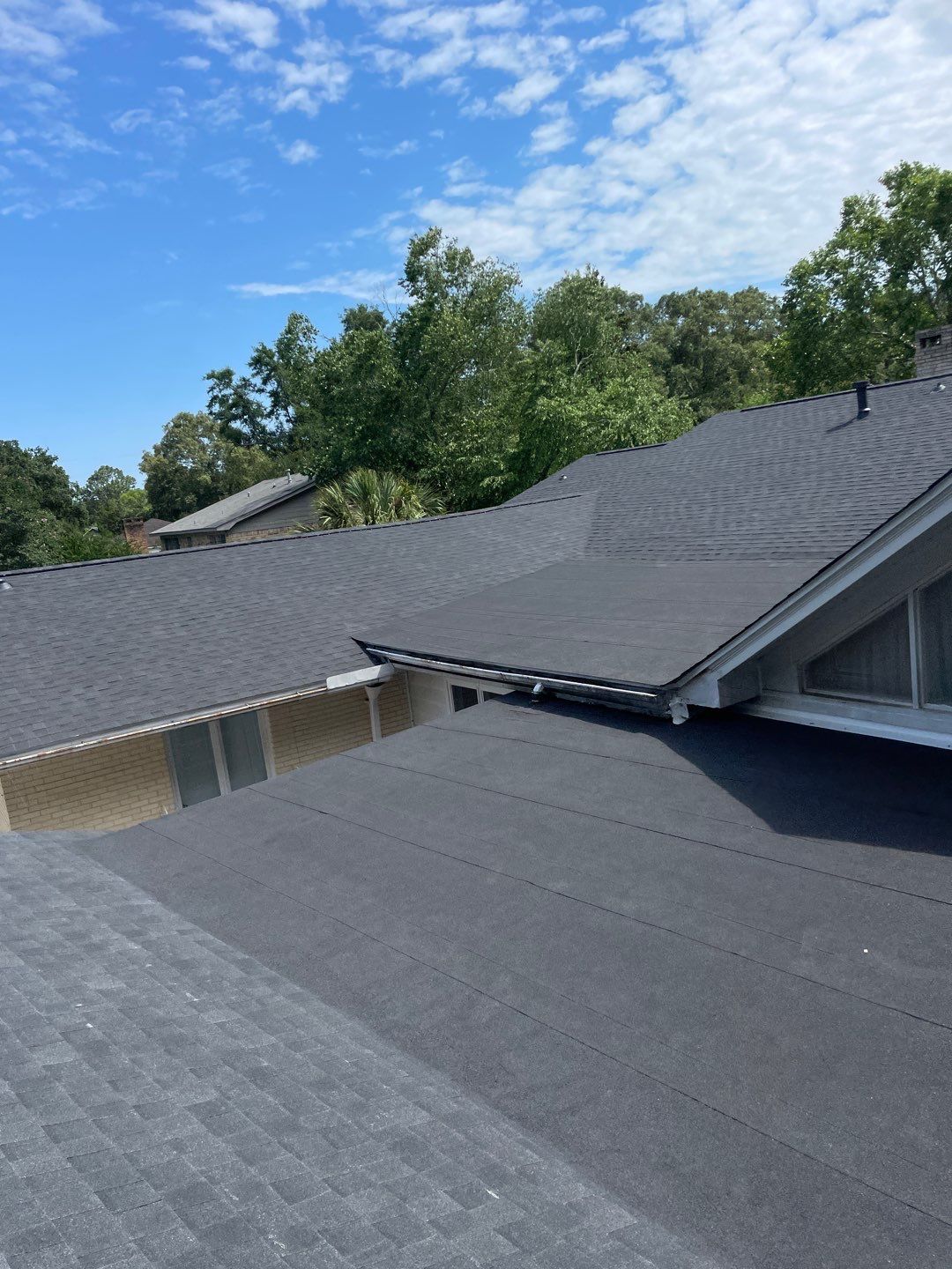 Residential Roofing Installation using Roof Replacement by American Roofing & Construction LLC