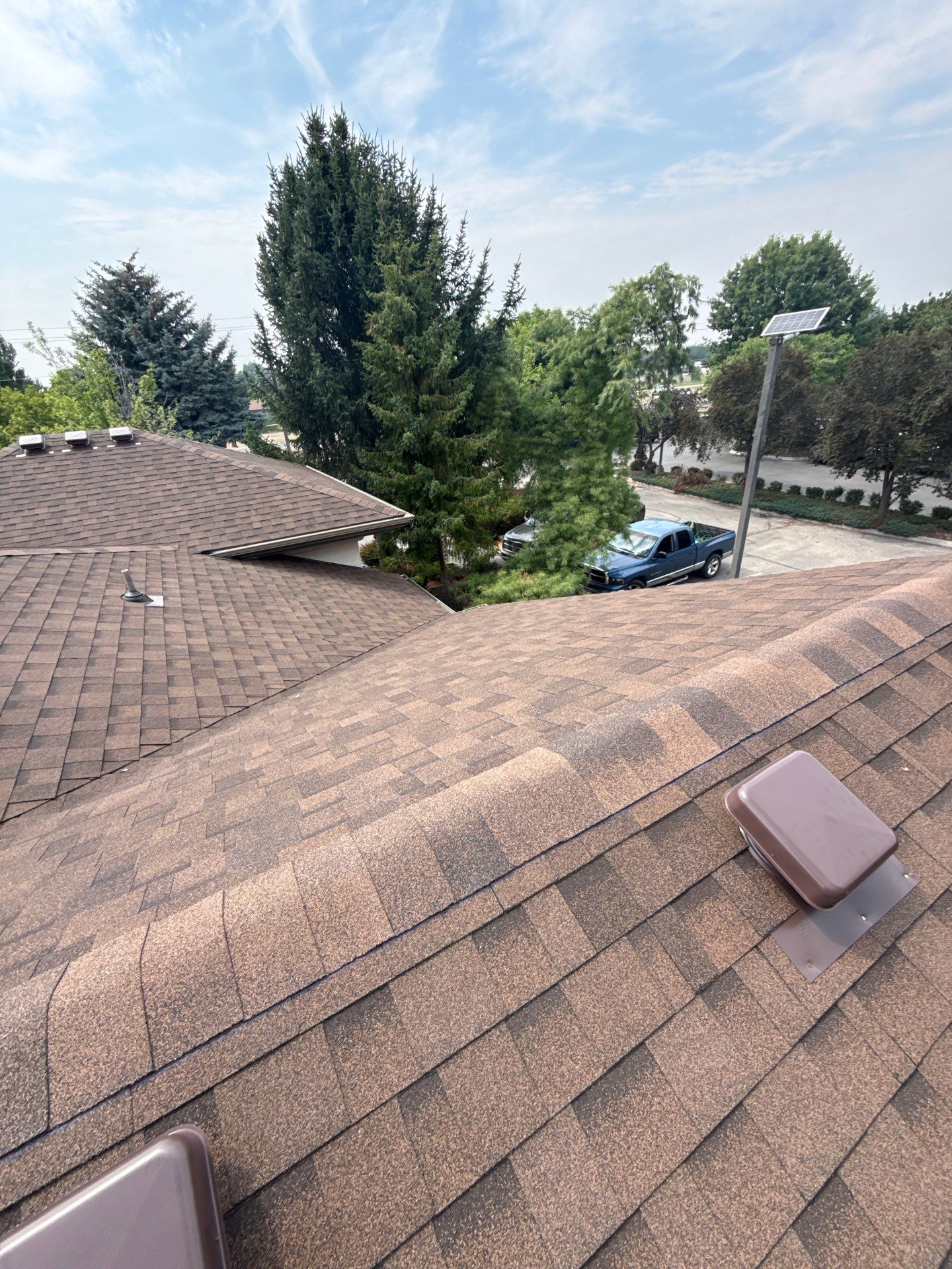 Boise Commercial Roof Replacement with Brown Architectural Shingles by Olive Roofing