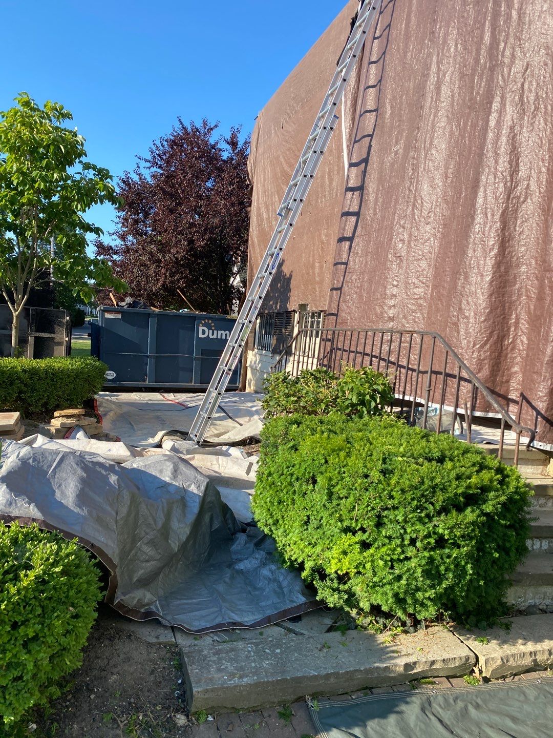 Residential Roofing Installation, Dec-tek walk-out porch roof, siding on garage by Absolute Roofing and Construction