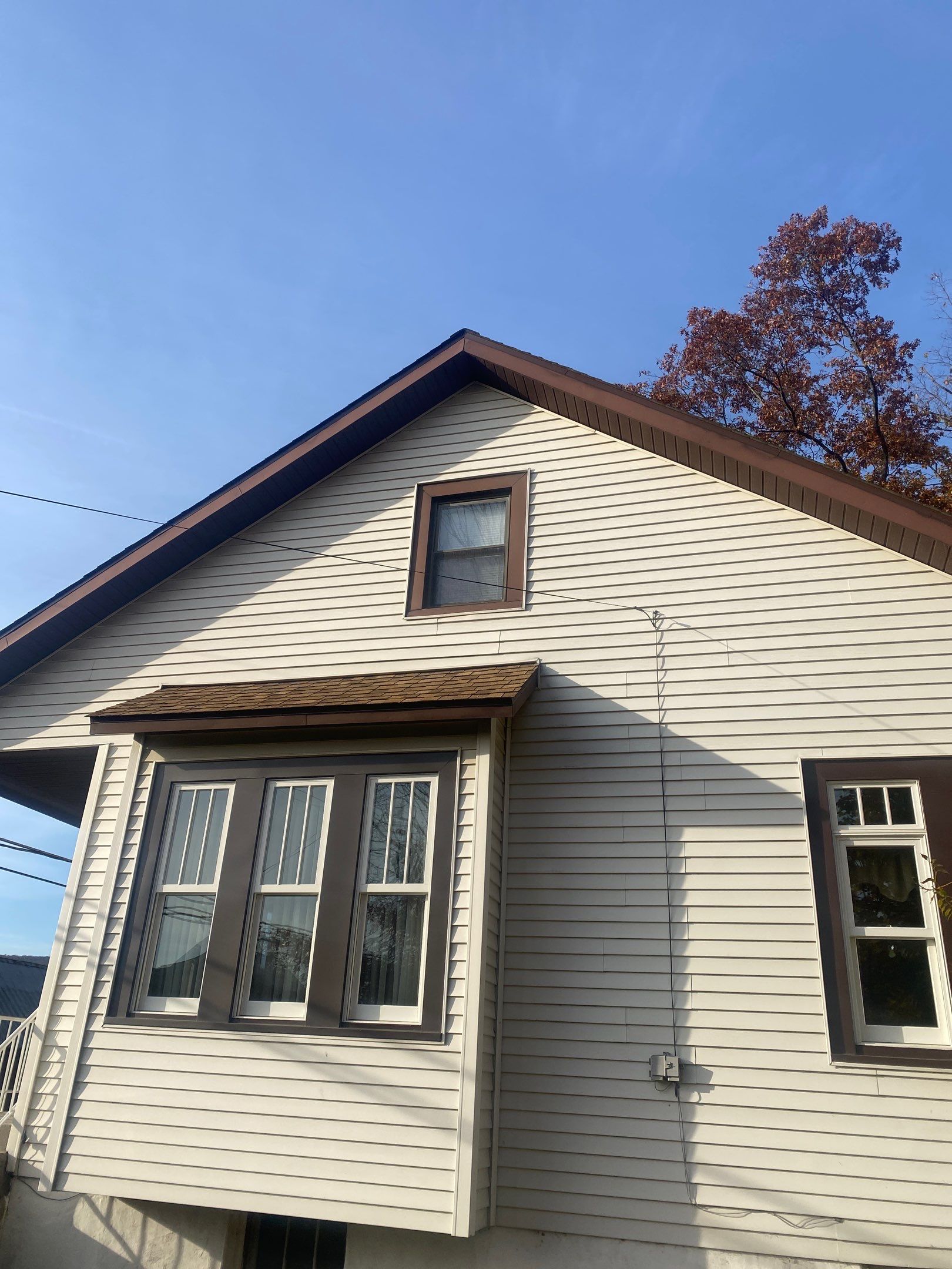 New Red Metal Garage Construction and Residential Window Replacement in Ashland by Esh Builders