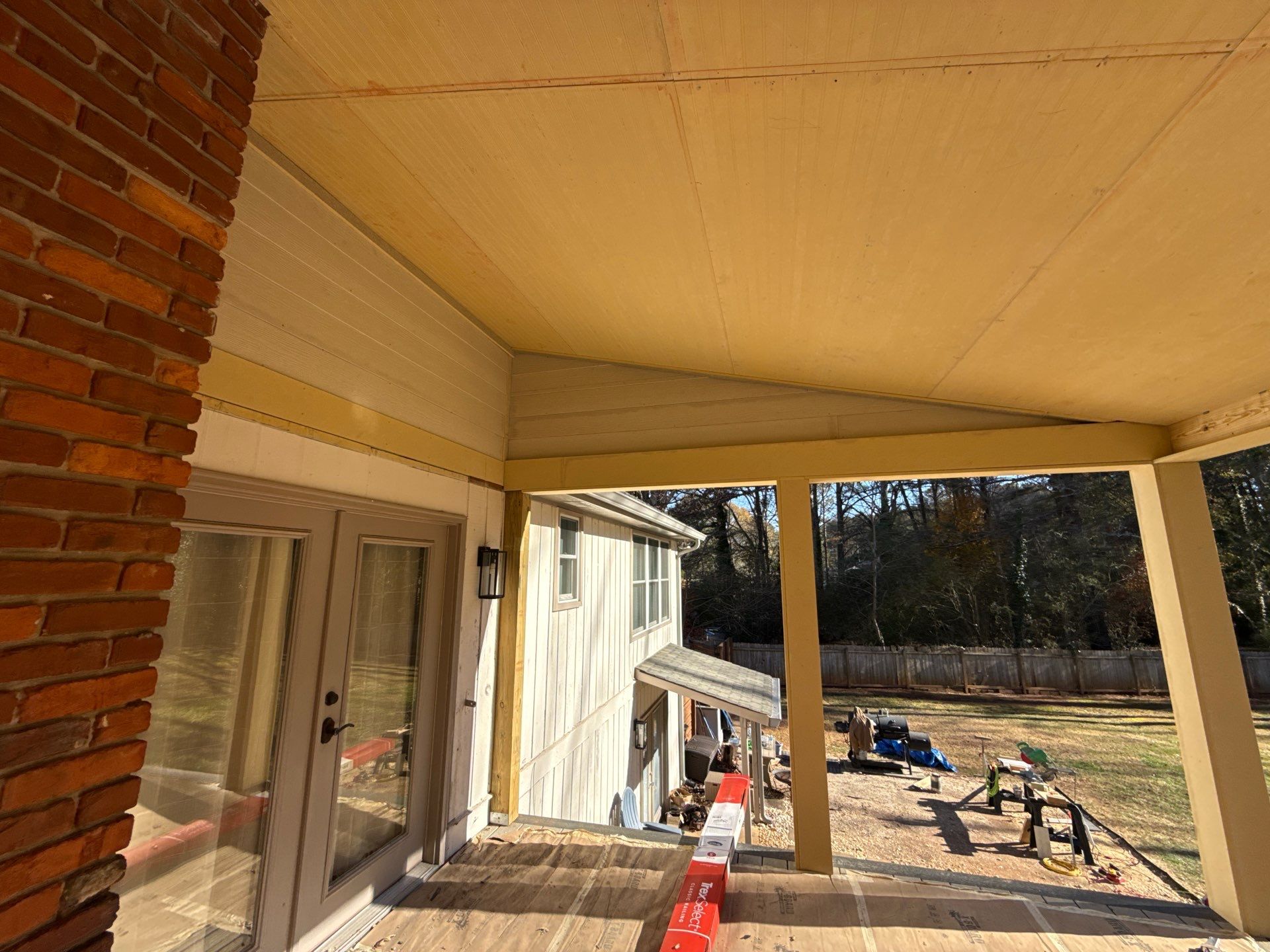 Deck and Shed Roof Style Covered Build using Trex Decking Products by Nelson Exteriors 