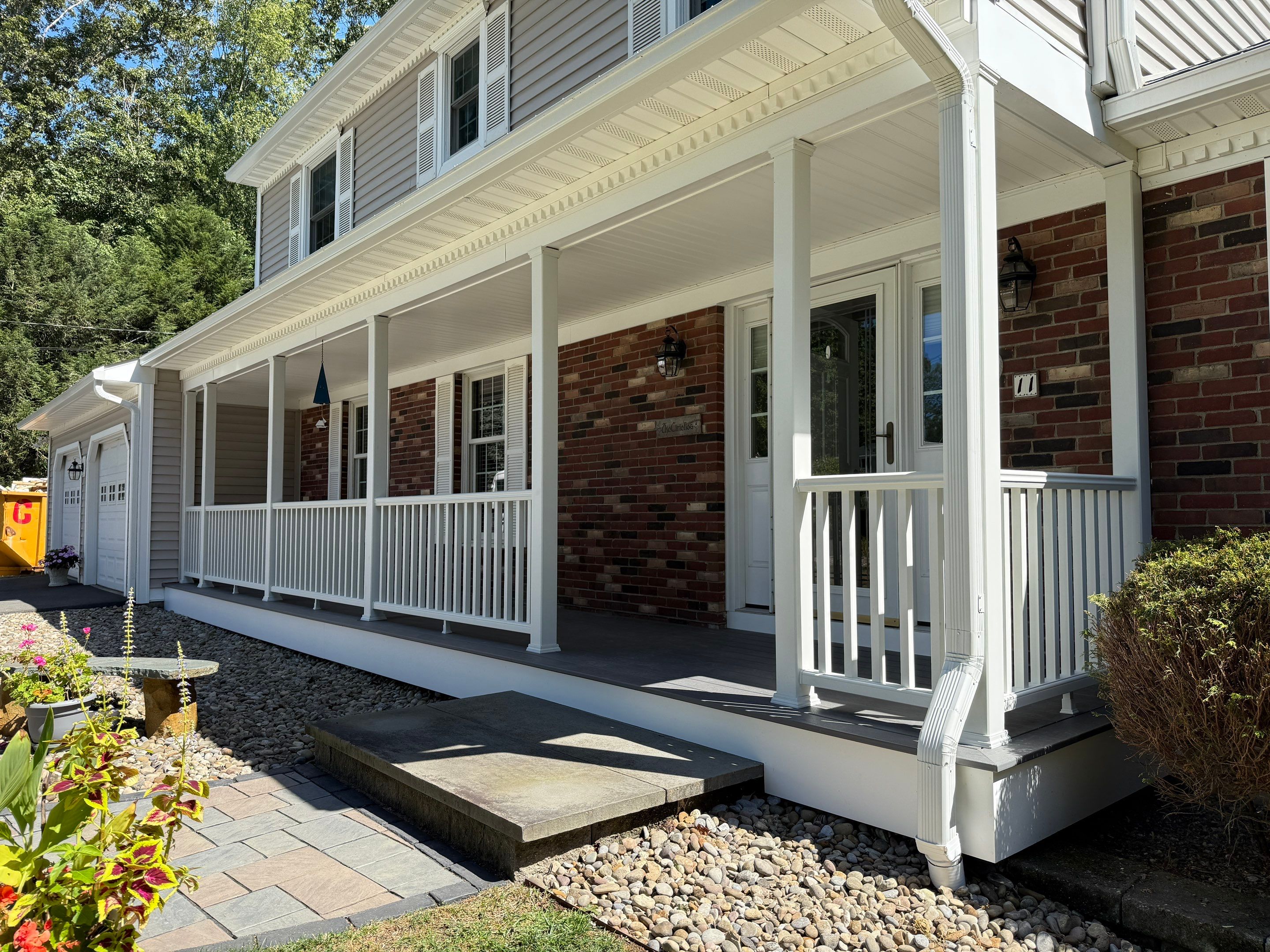Replacement of front and back decks using Trex Lineage Island mist and Trex Lineage Rainier by DiGiorgi Roofing and Siding Inc