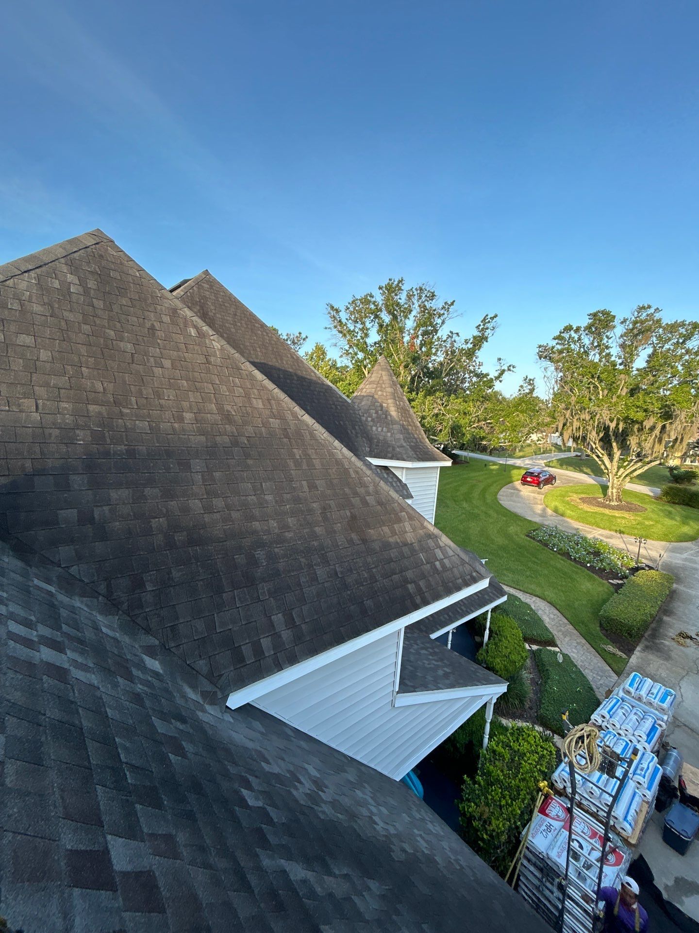 Residential Roofing Installation with Black Shadow Shingles in Clermont by Pinnacle Roofing Group