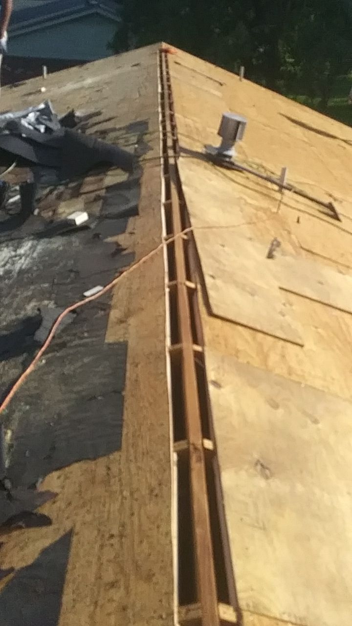 Residential Roofing Installation using Roof Replacement by American Roofing & Construction LLC