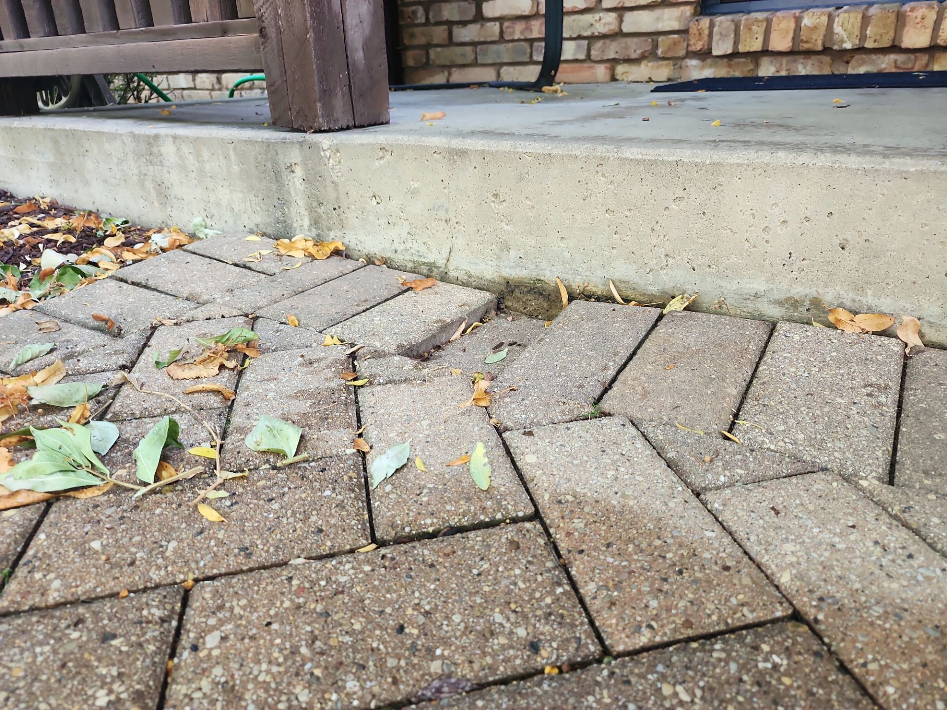 Arlington Heights Brick paver repair, cleaning and sealing by Northern Power Washing LLC.