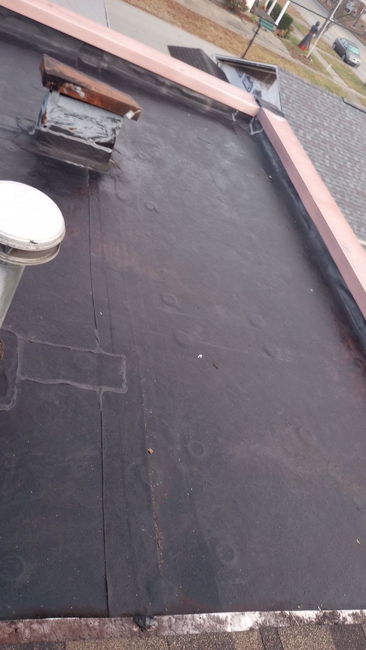 Commercial Roofing Installation using Performance Shingles by Mr. Roofer