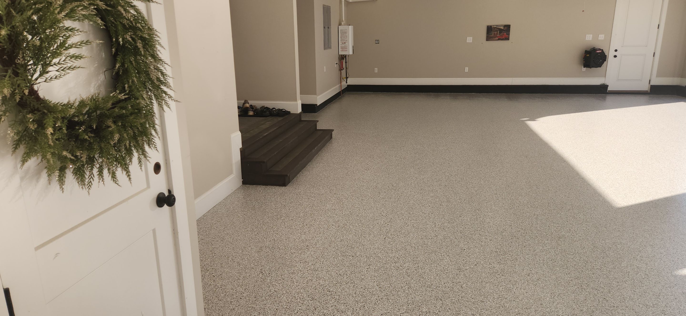 Front Porch and Garage using Coyote & Pumice by Elite Floor Solutions