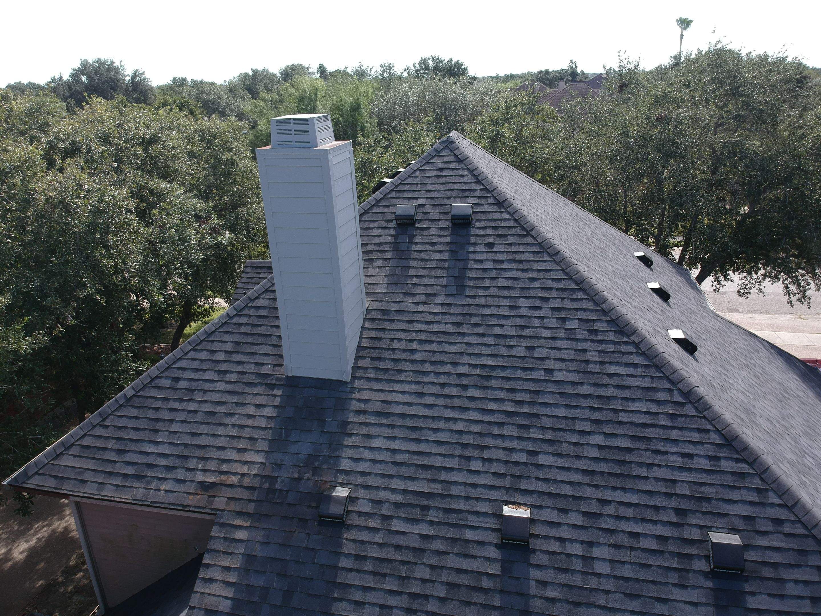 Residential Roofing Installation using Certainteed Landmark Moire Black by Galvan Roofing and Construction
