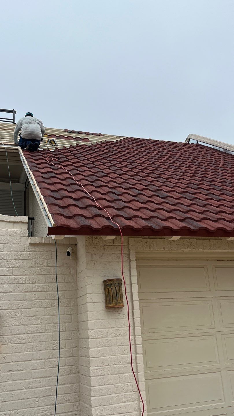 Off with the Tile and on with the TILCOR stone coated metal. by Bayfront Roofing and Construction