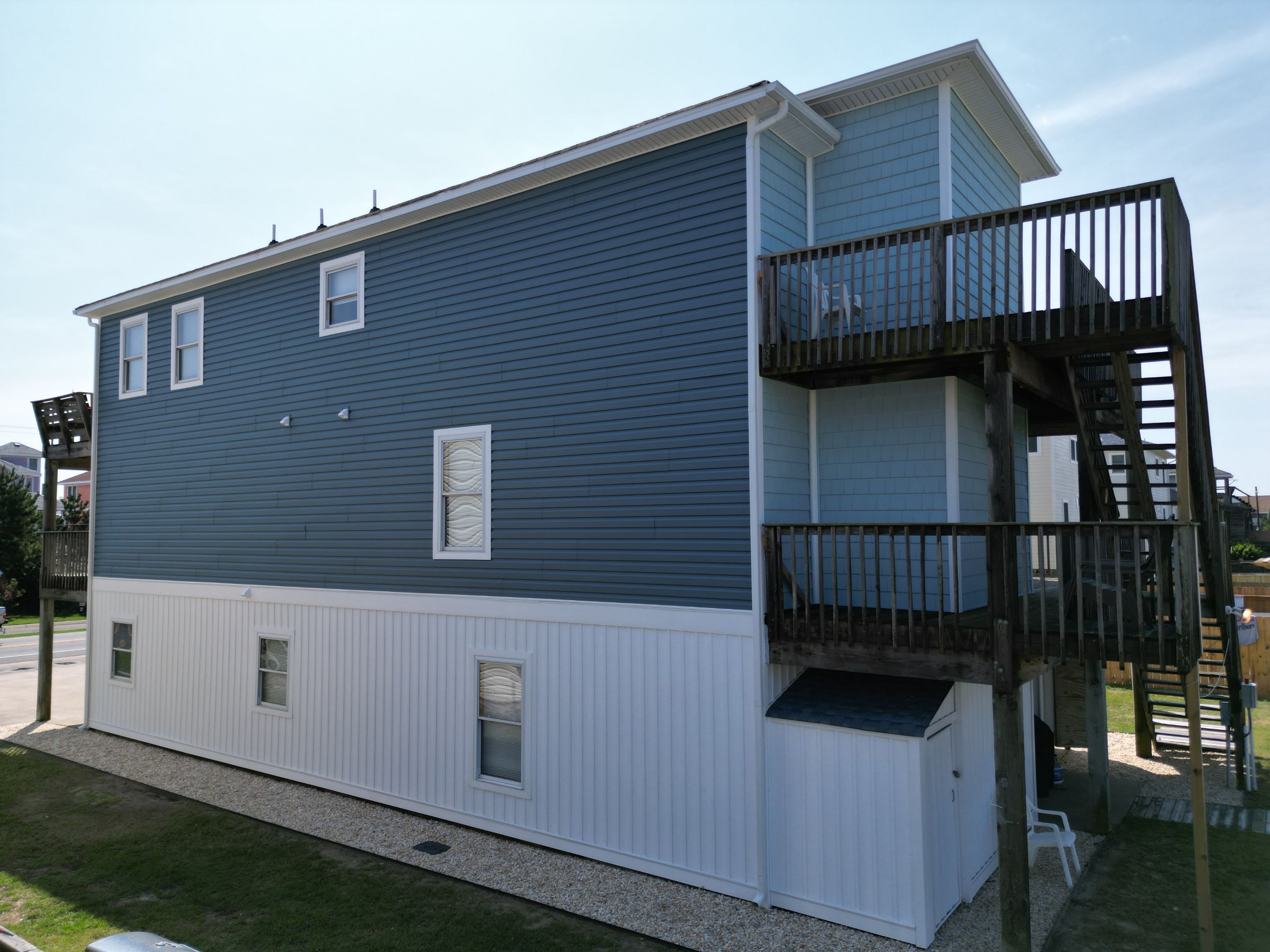 From Bland to Blue by Gallop Roofing & Remodeling, Inc.