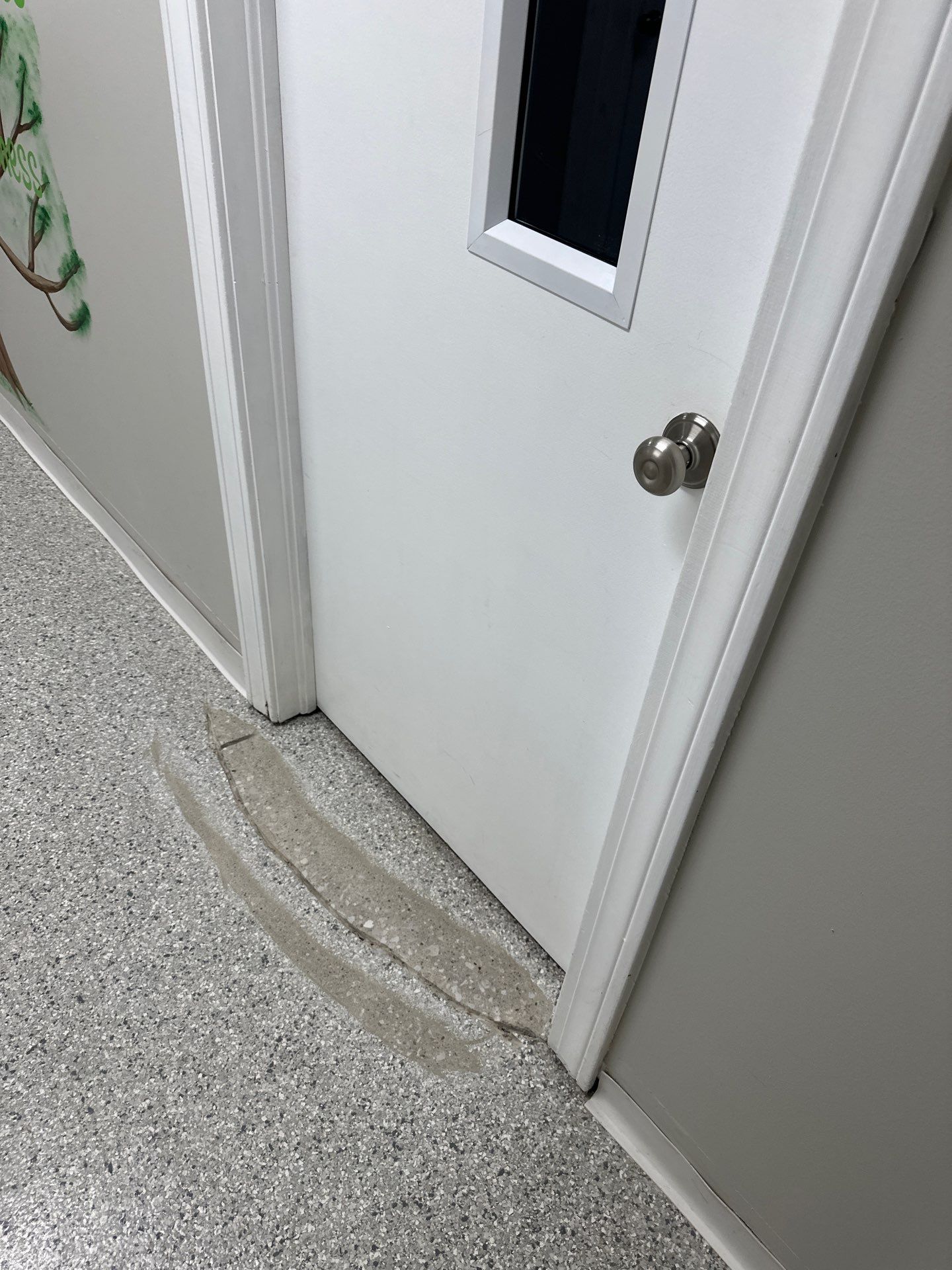 Medina Cracked basement floor with Epoxy by Beck Restoration Management Group