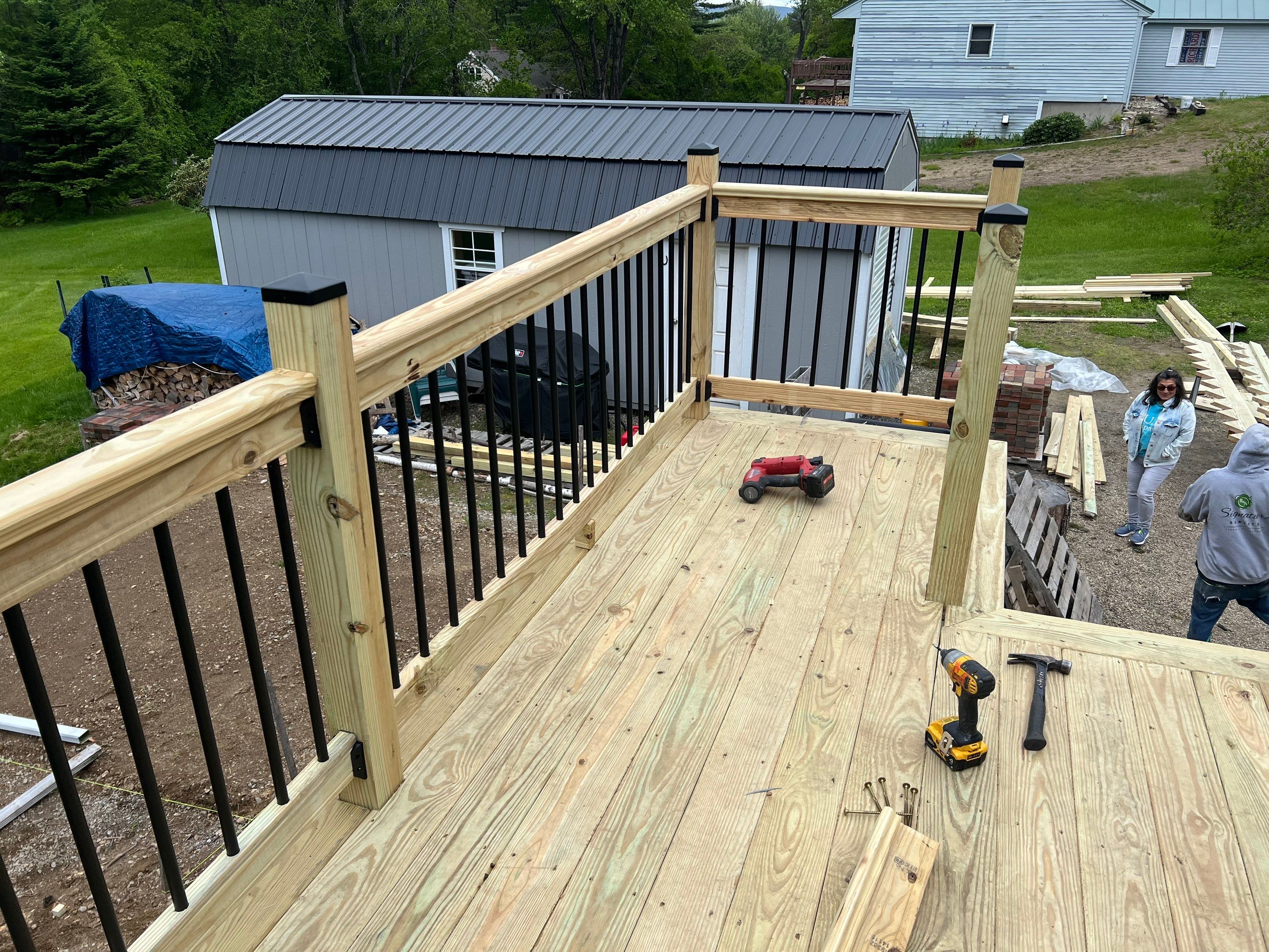 Moultonborough, NH – Pressure-Treated Deck Installation by Tall pine roofing