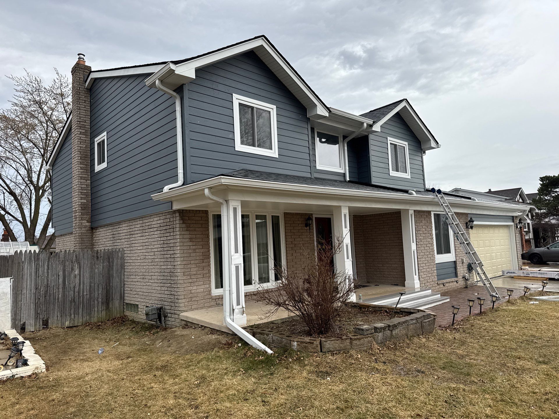 Siding Replacement using Alside Midnight Blue by 180 Contractors