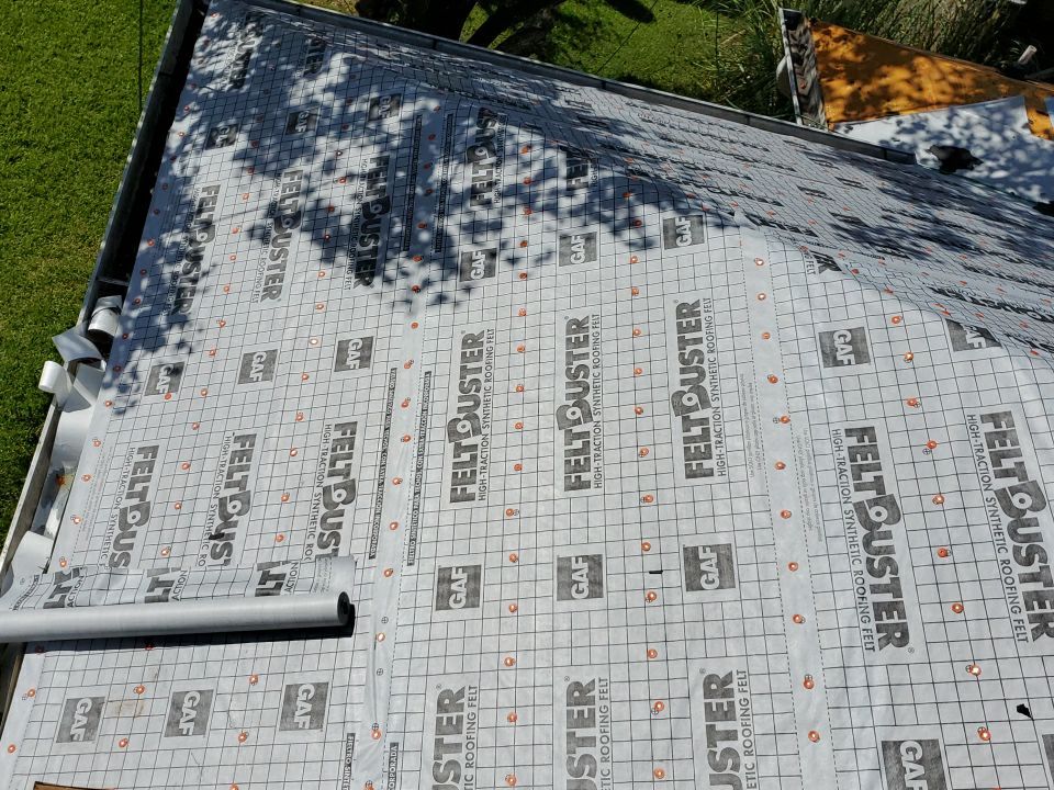 Residential Roofing Installation using Roof Replacement by American Roofing & Construction LLC