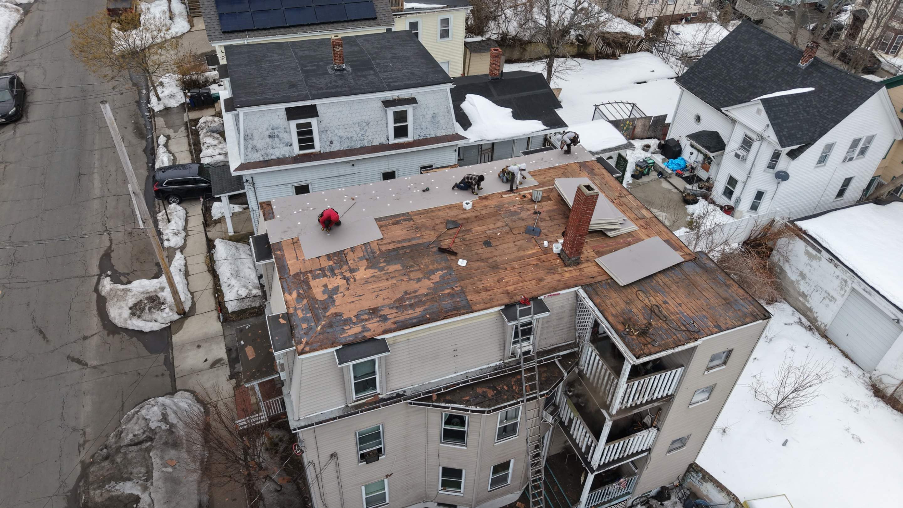 Gravel Roof Tear-Off & EPDM Rubber Roof Conversion in Haverhill, MA by JOHNNYS PRO