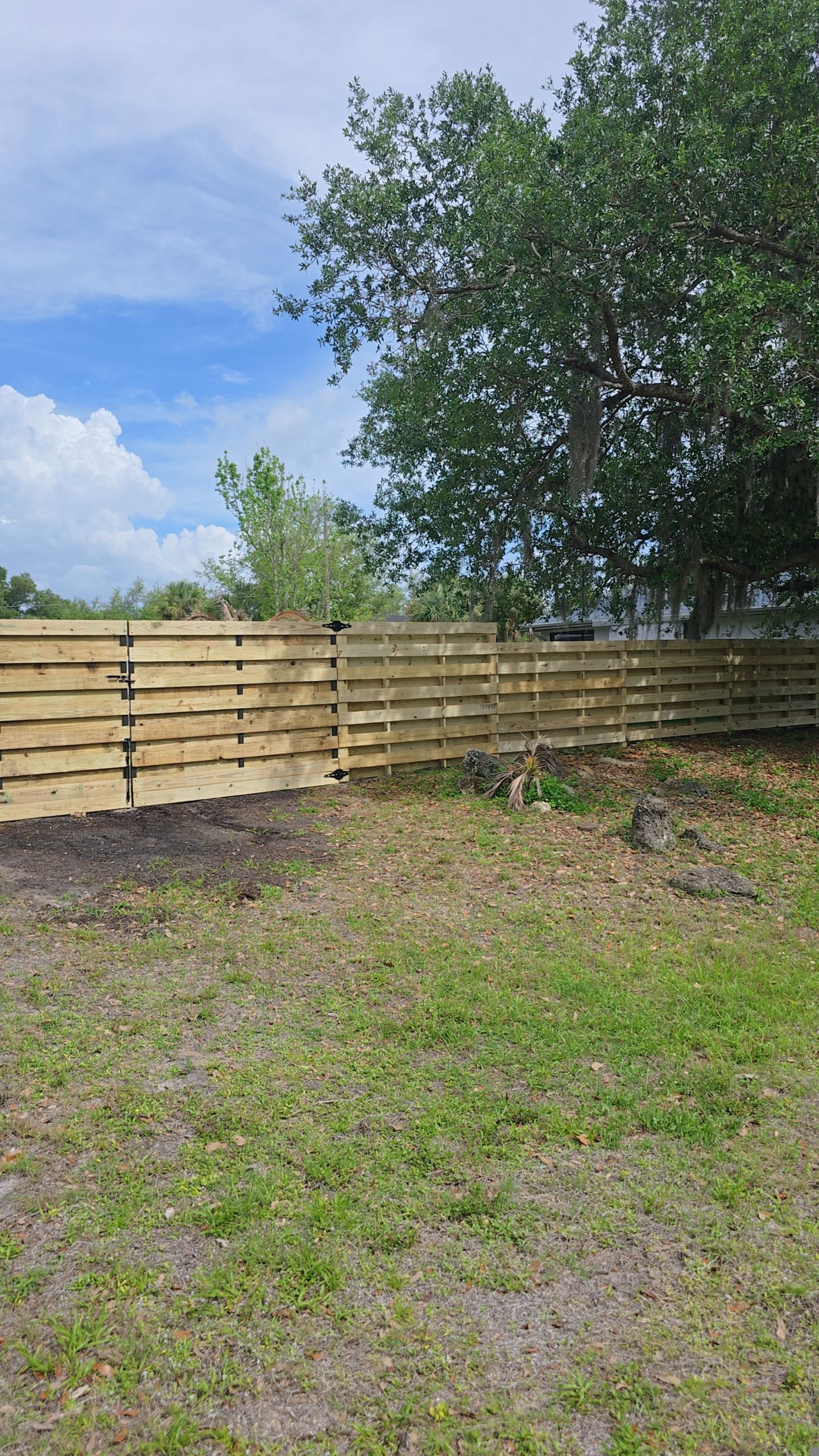 Horizontal Shadowbox Fence in Port Charlotte by True Fence LLC