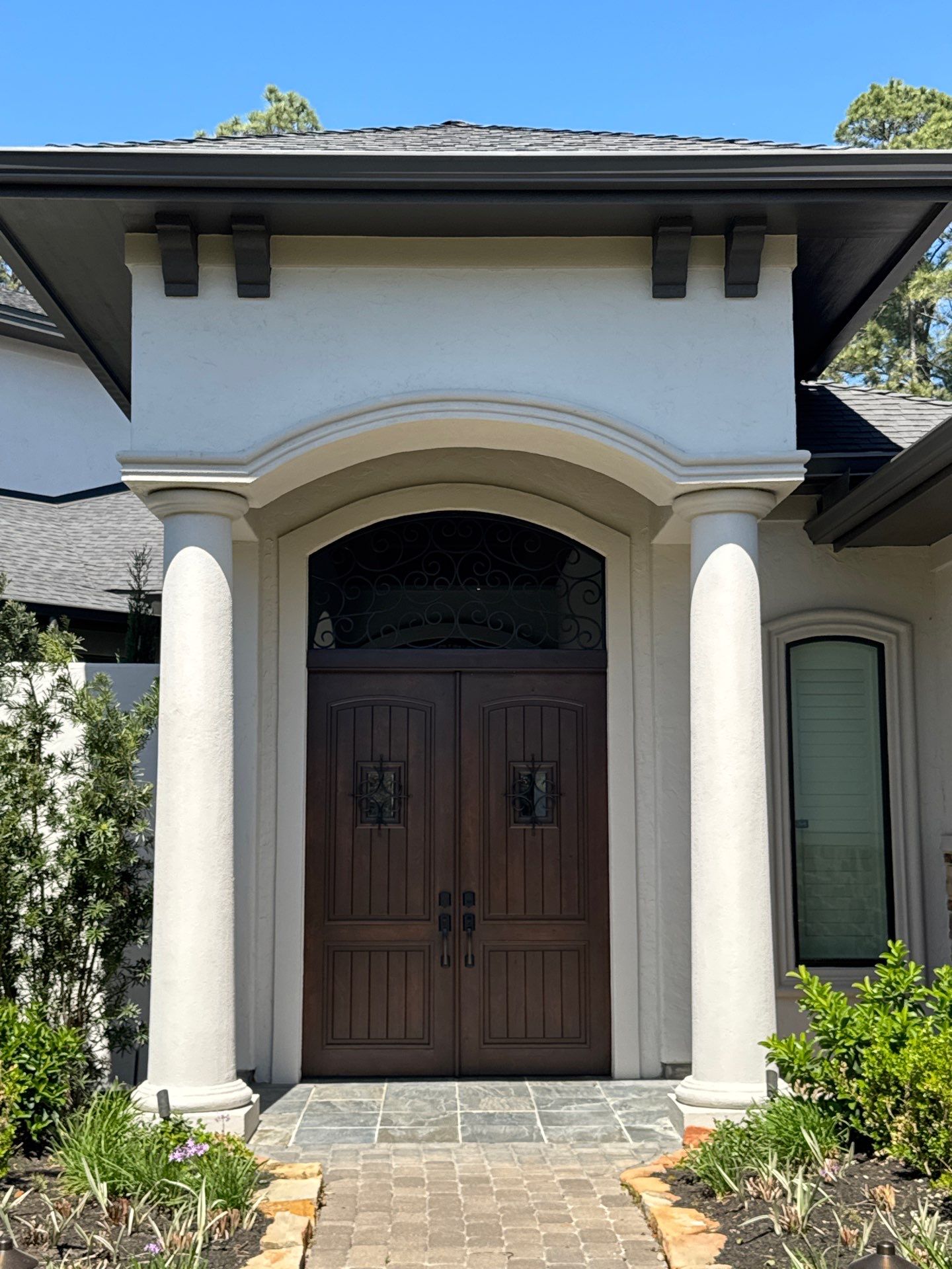 Complete Exterior Painting and Stucco Refinishing in Spring by Rolling Nations