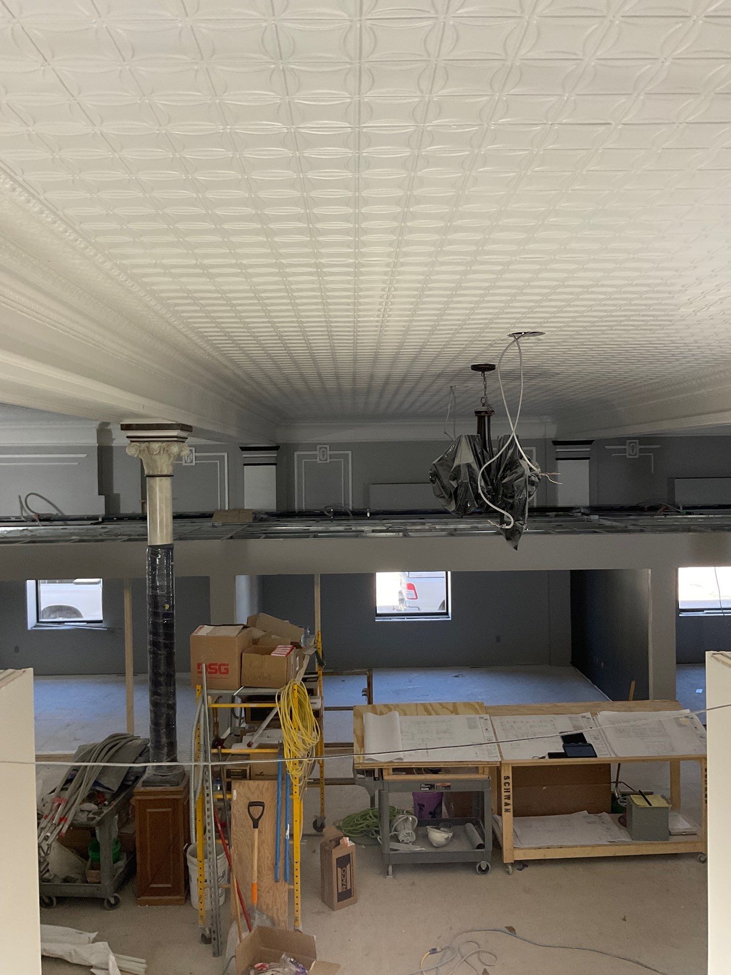 Commercial Interior Remodel for Dacotah Bank Featuring Decorative Tin Ceilings by Select Painting, Coatings & Garage Cabinets