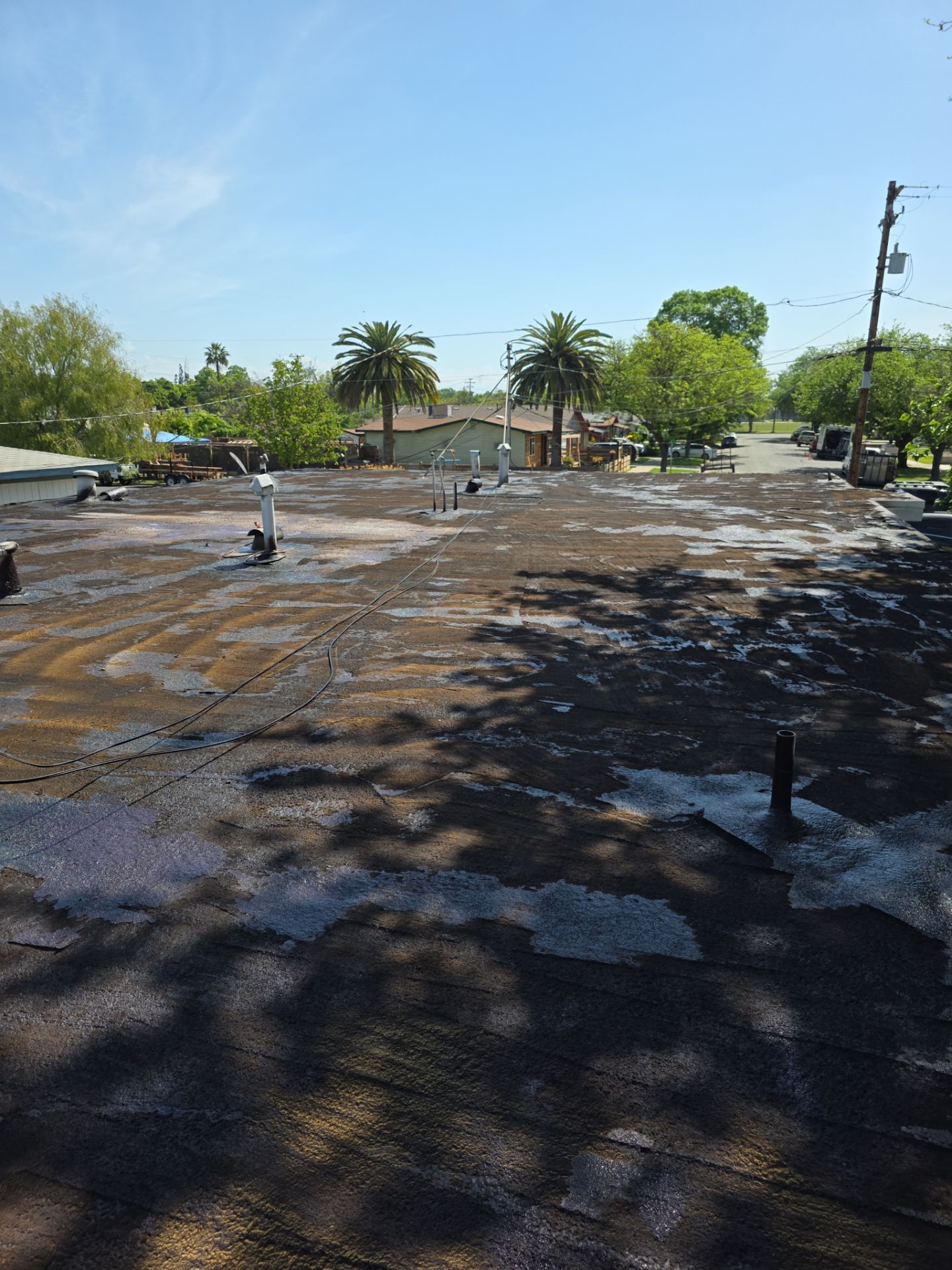 Foam Refurbish using Conklin Benchmark/PUMA XL coatings and spray foam by Straight Edge Roofing Inc