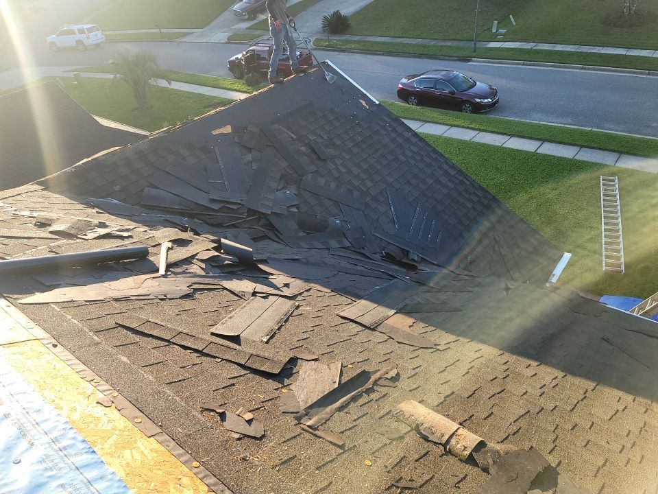 Residential Roofing Installation using Roof Replacement by American Roofing & Construction LLC