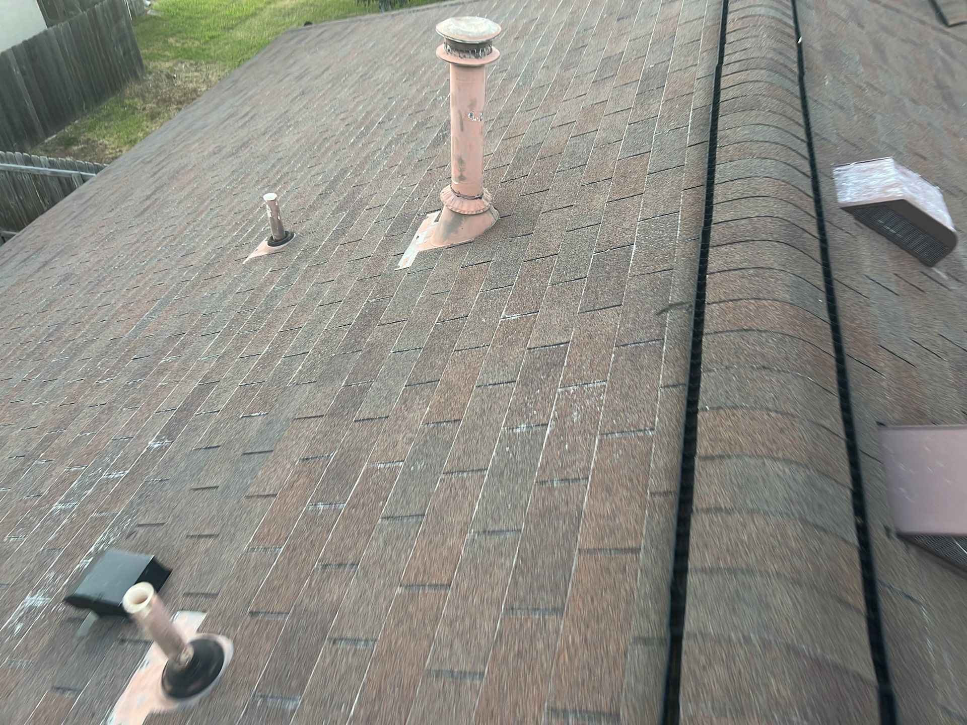 Residential Roof Replacement and Fence Restoration in Cedar Park by Caliber Restoration LLC