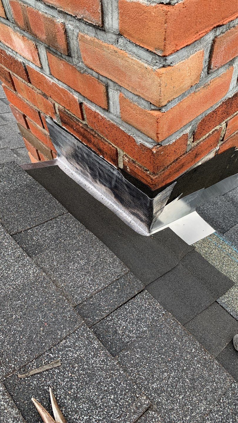 Residential Roofing Repair using Chimney Flashing by A Plus Exterior