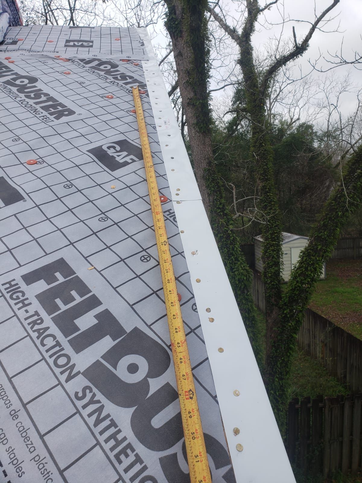 Residential Roofing Installation using Roof Replacement by American Roofing & Construction LLC