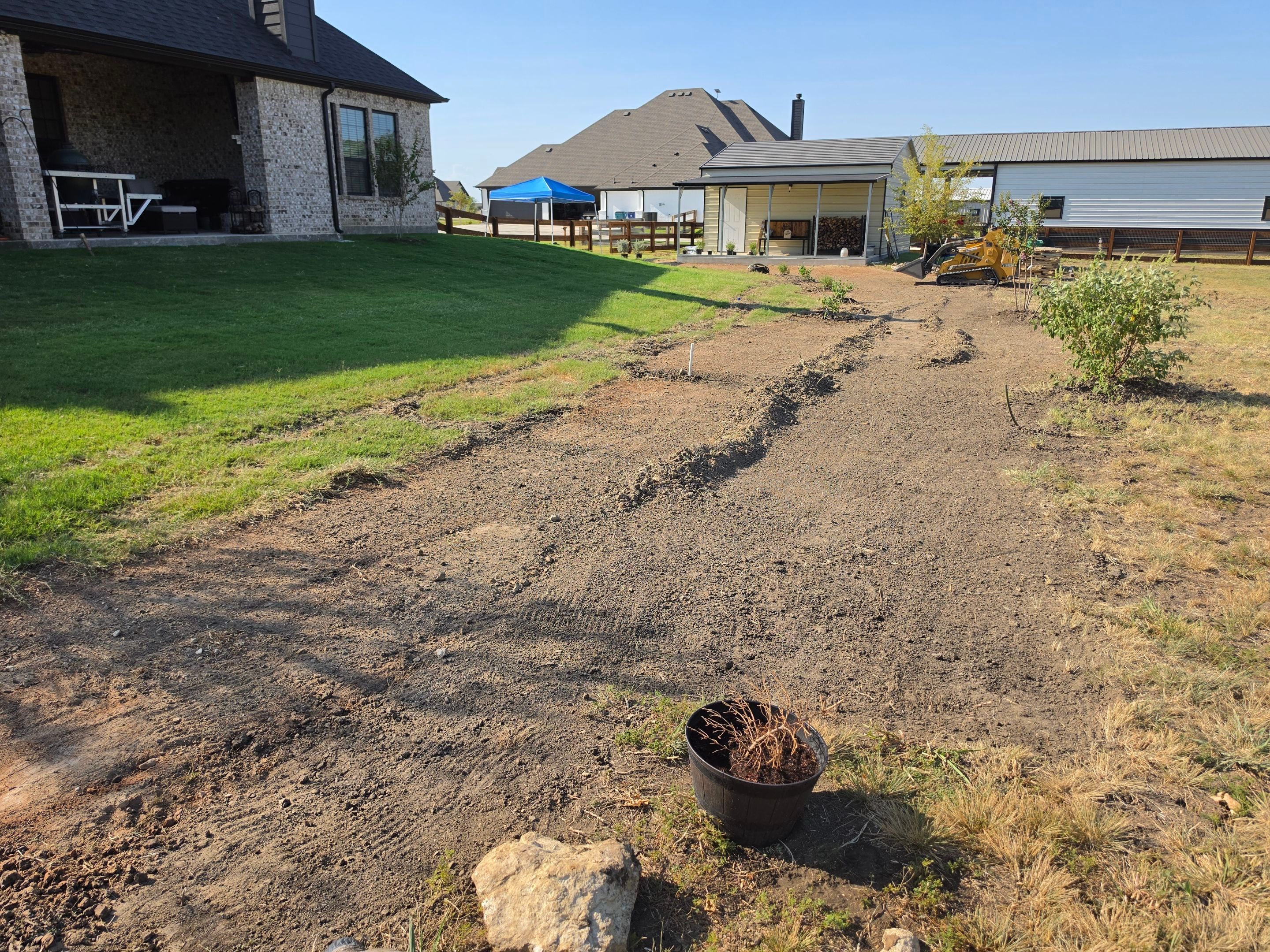 Argyle Residential Landscape Installation with Flagstone Path and Outdoor Seating by Conserva Irrigation NW Dallas