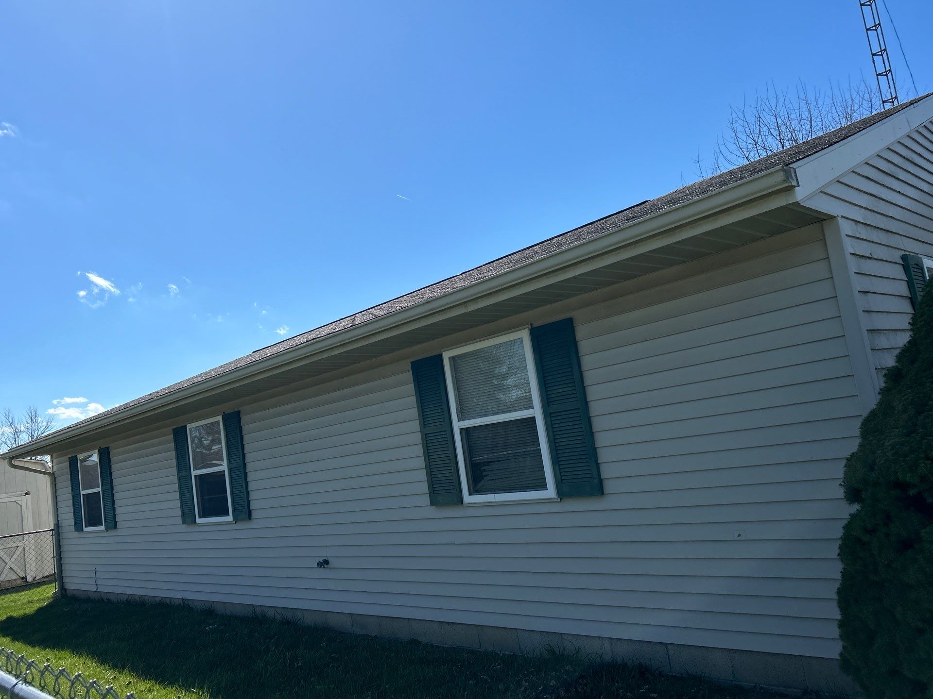 Storm Damage Residential Roof and Siding Installation by WIW Enterprises Inc
