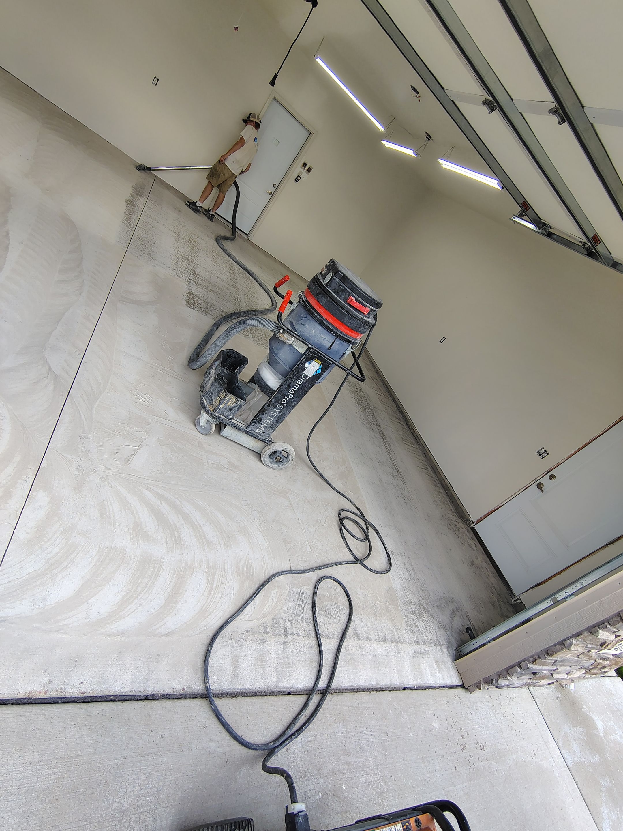 Garage Floor Coating with Coyote Decorative Chip in Tea by Select Painting, Coatings & Garage Cabinets