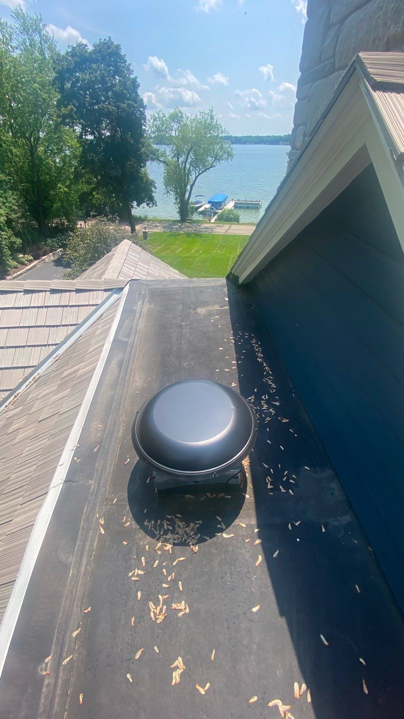 DaVinci Roof Installation with Snow Guards in Oconomowoc Lake by Custom Installations